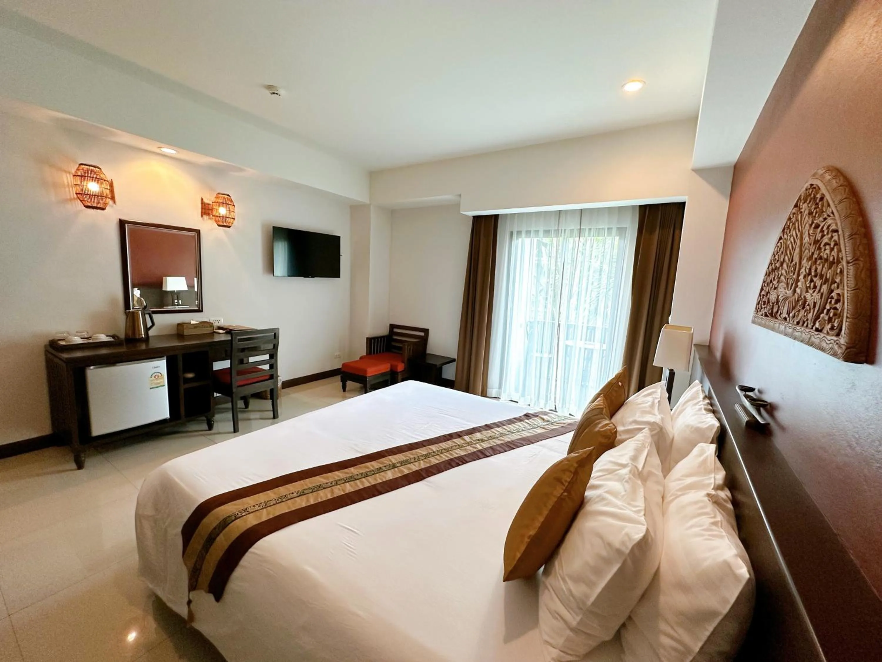 Bed in Navatara Phuket Resort