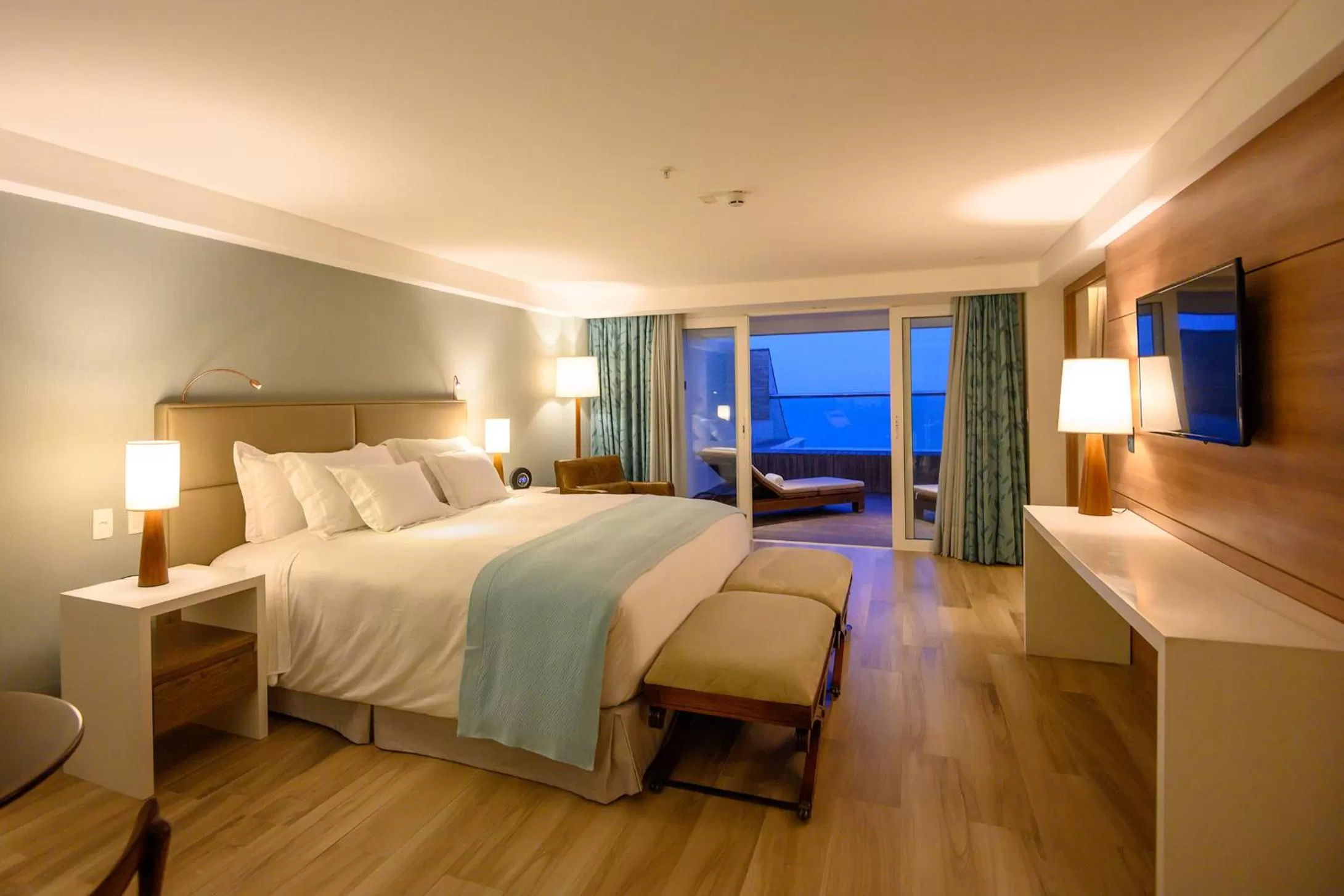 Bed in Vogal Luxury Beach Hotel & SPA