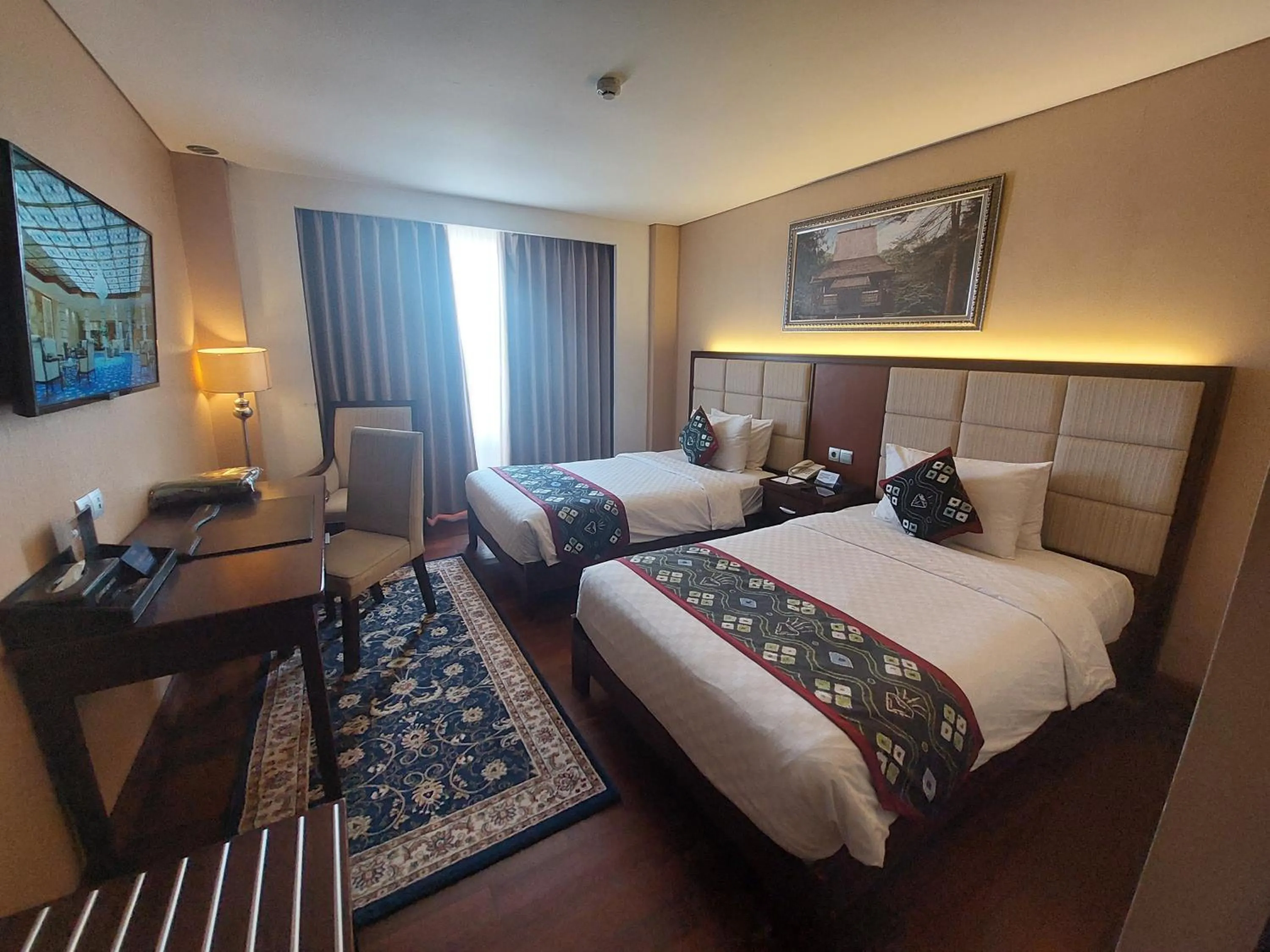Bed in Grand Dafam Q Hotel Banjarbaru || DHM Syariah