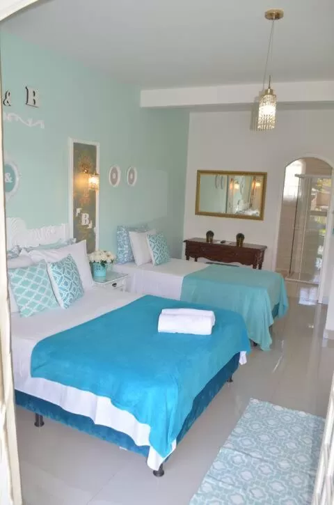 Bed in La Maison Brasiliana B&B