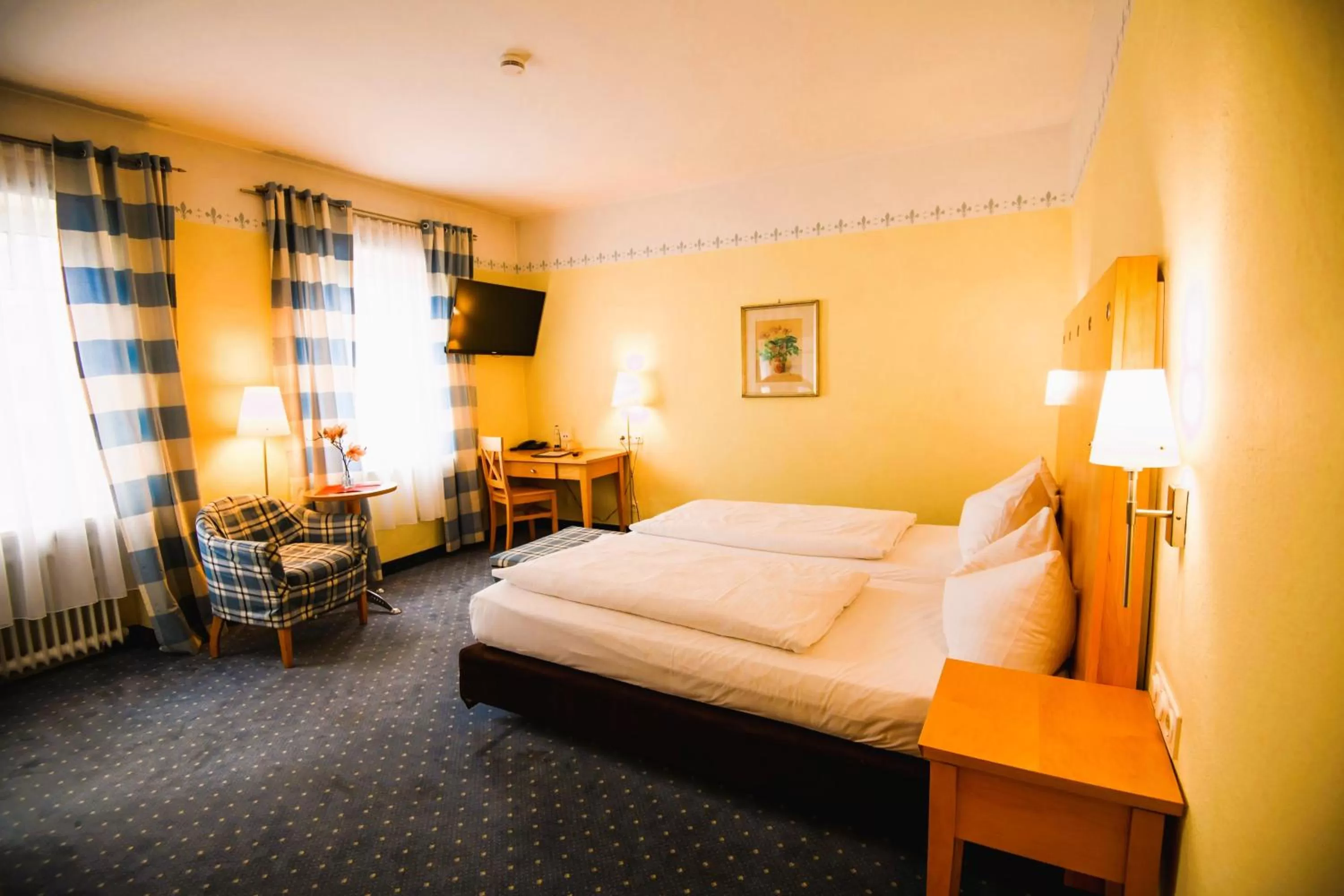 Bed in Hotel Rosenheimer Hof