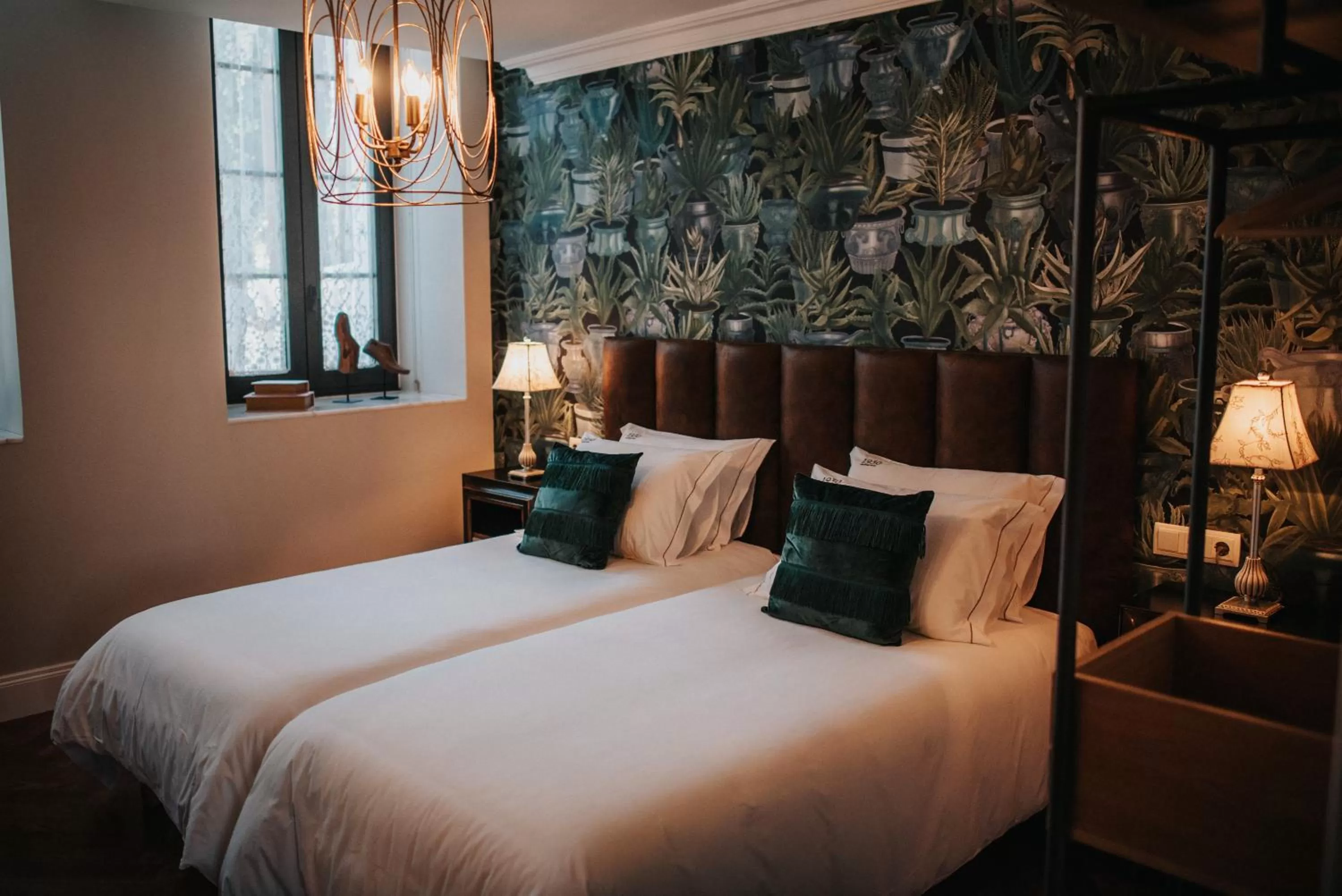 Bed in 1930 Boutique Hotel