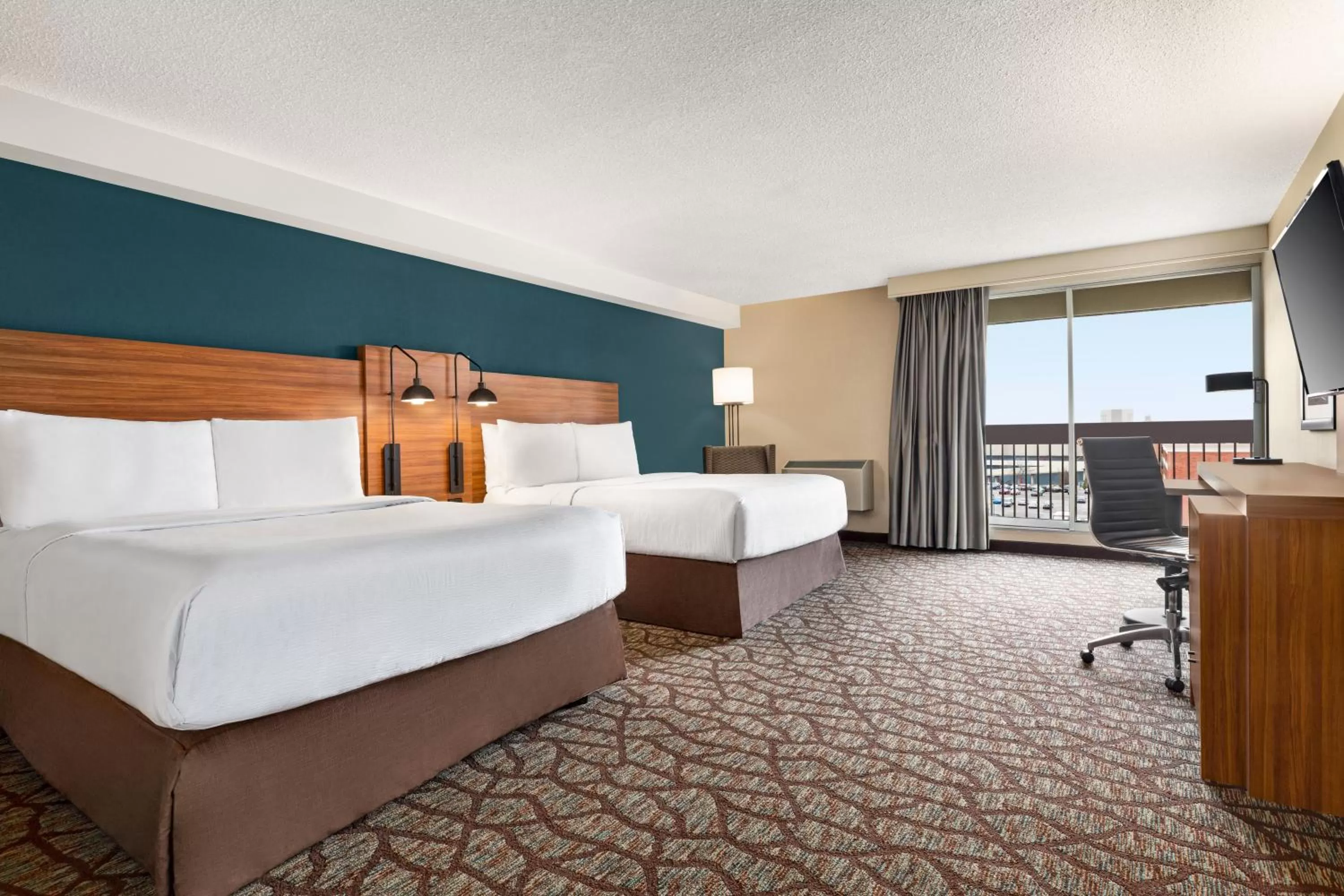 Bed in Wyndham Garden Niagara Falls Fallsview