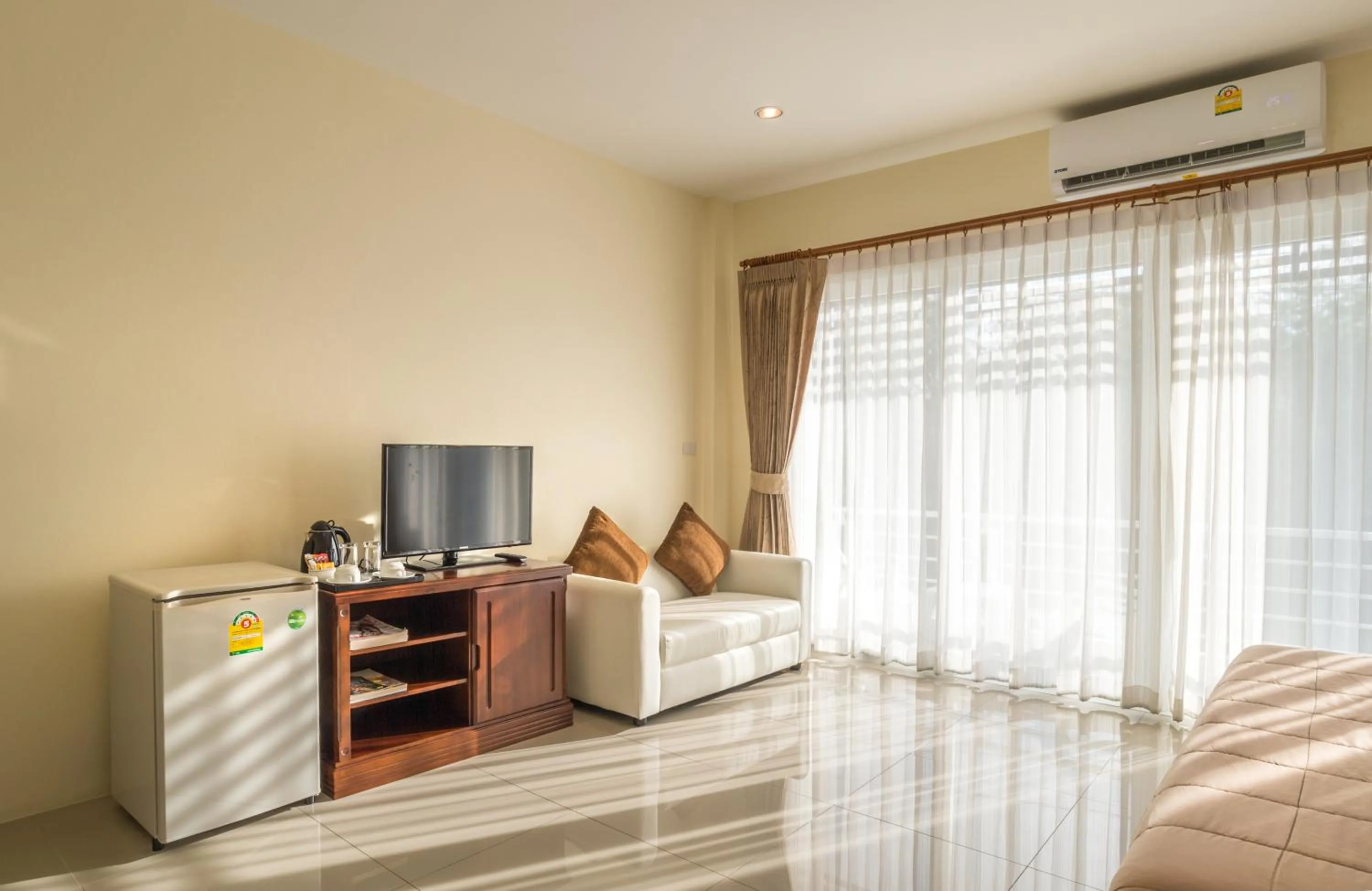Communal lounge/ TV room in Alisa Krabi Hotel-SHA Plus
