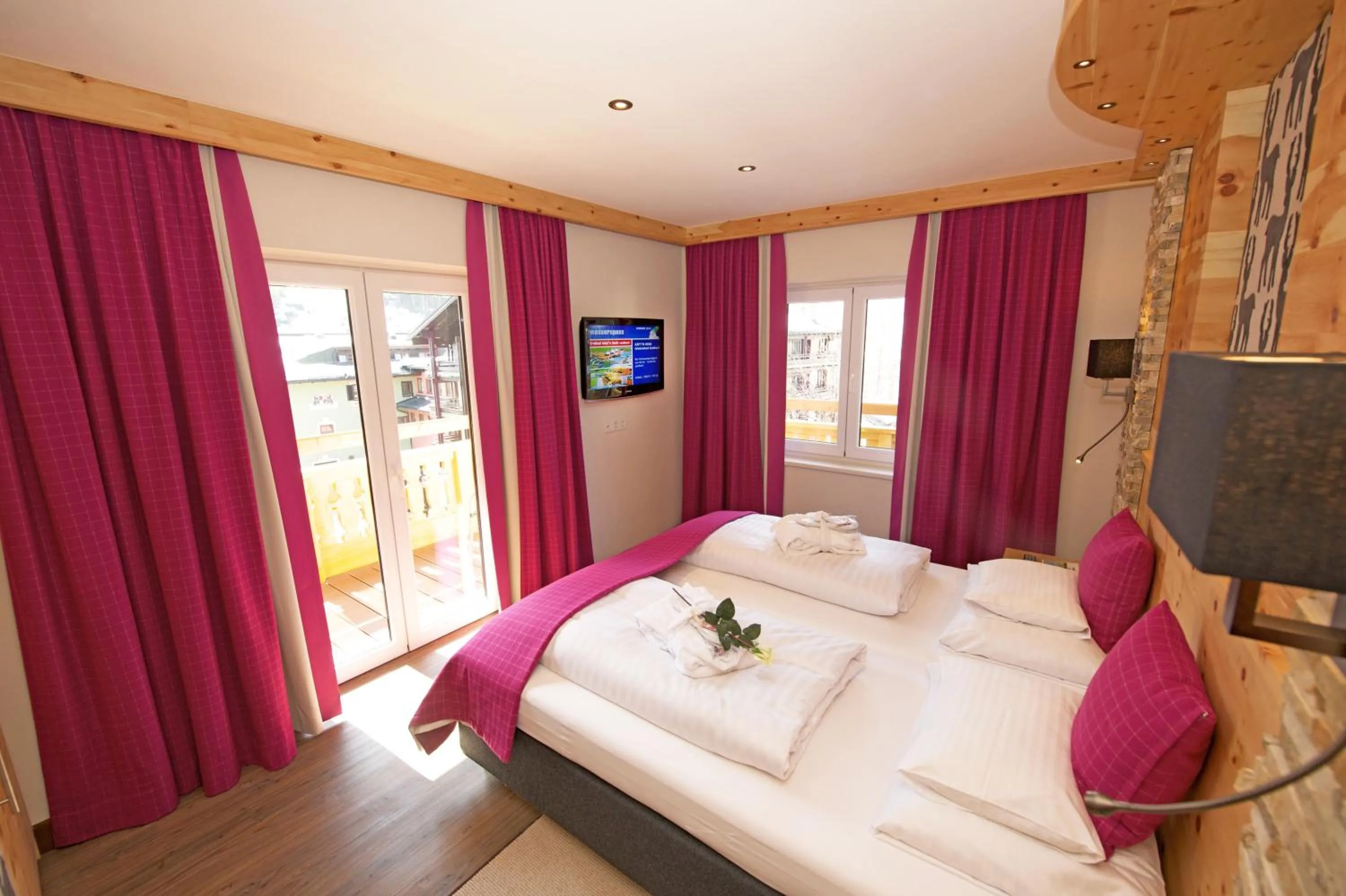 Photo of the whole room, Bed in JUFA Alpenhotel Saalbach