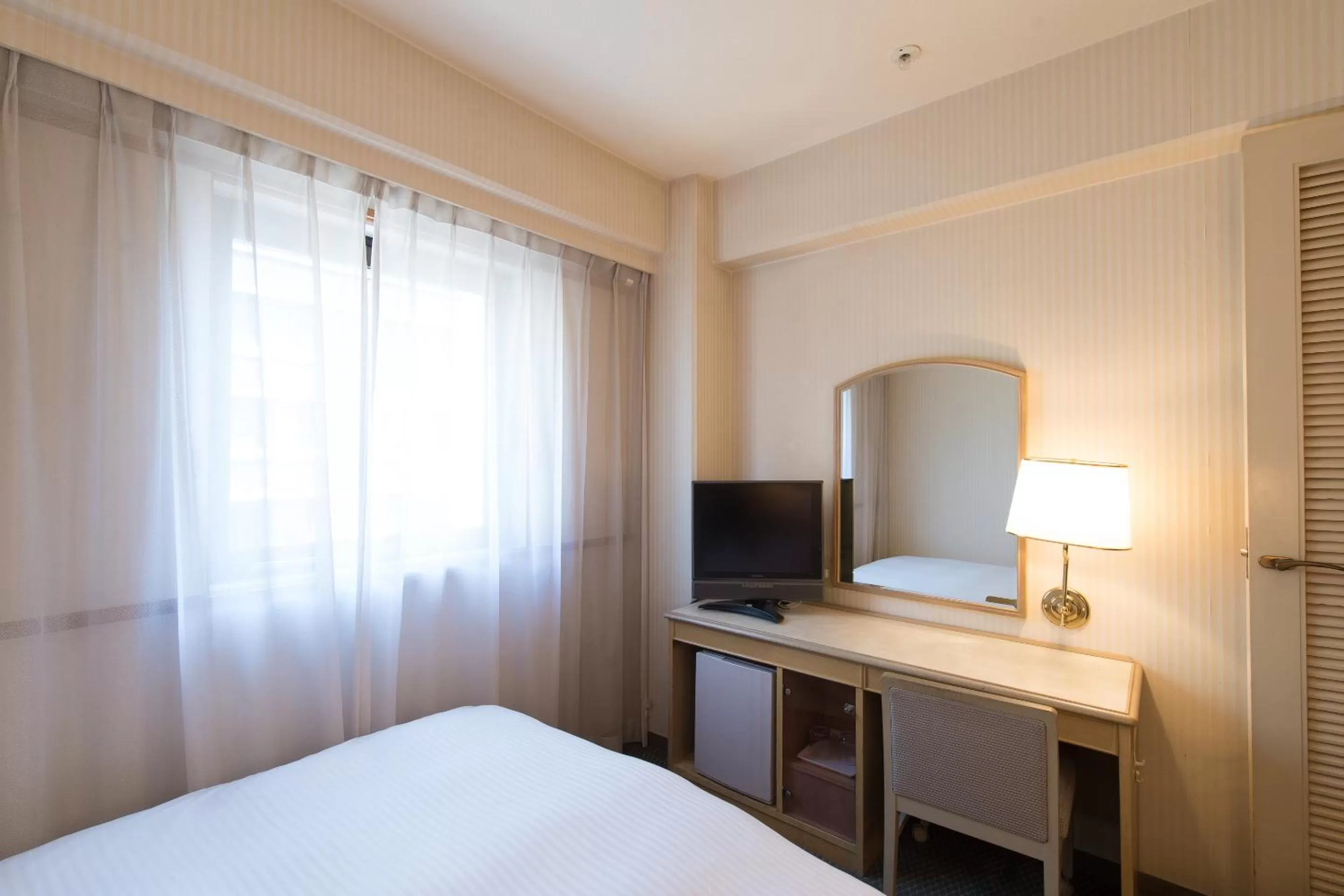 Photo of the whole room, Bed in Tabist Hotel Tetora Kitakyushu