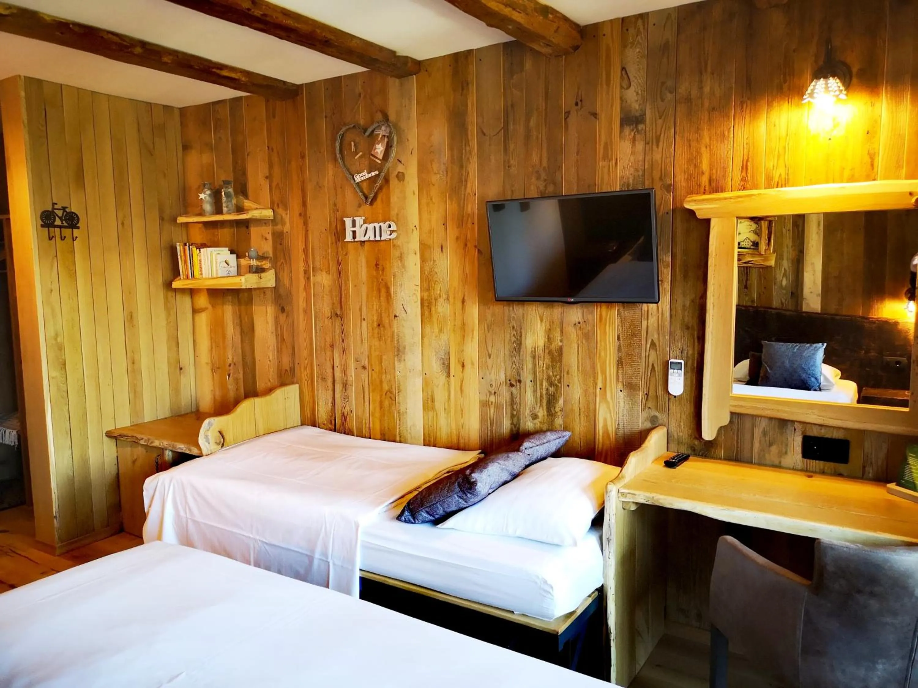 Bed in Ribno Alpine Hotel