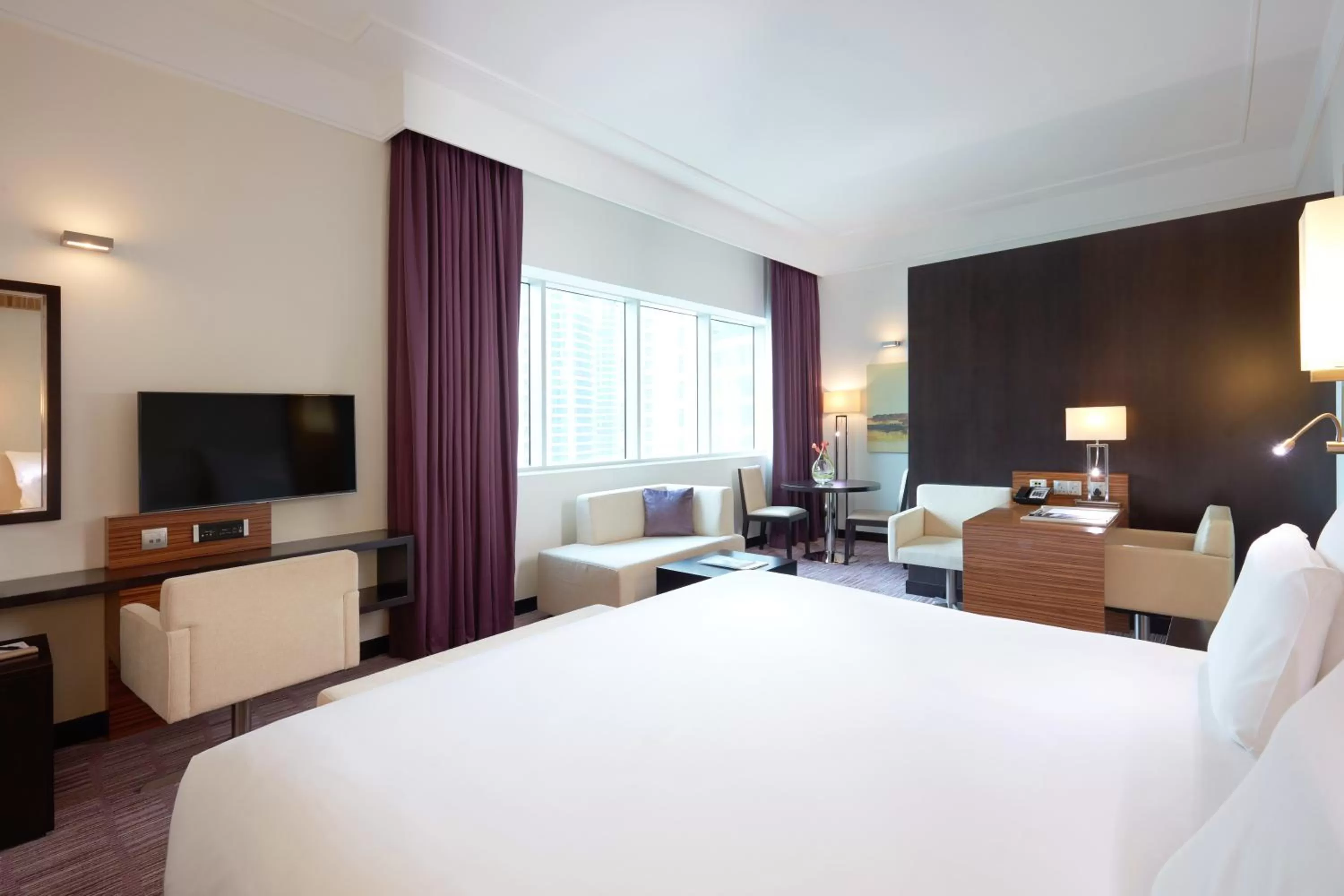 Photo of the whole room, Bed in Pullman Dubai Jumeirah Lakes Towers