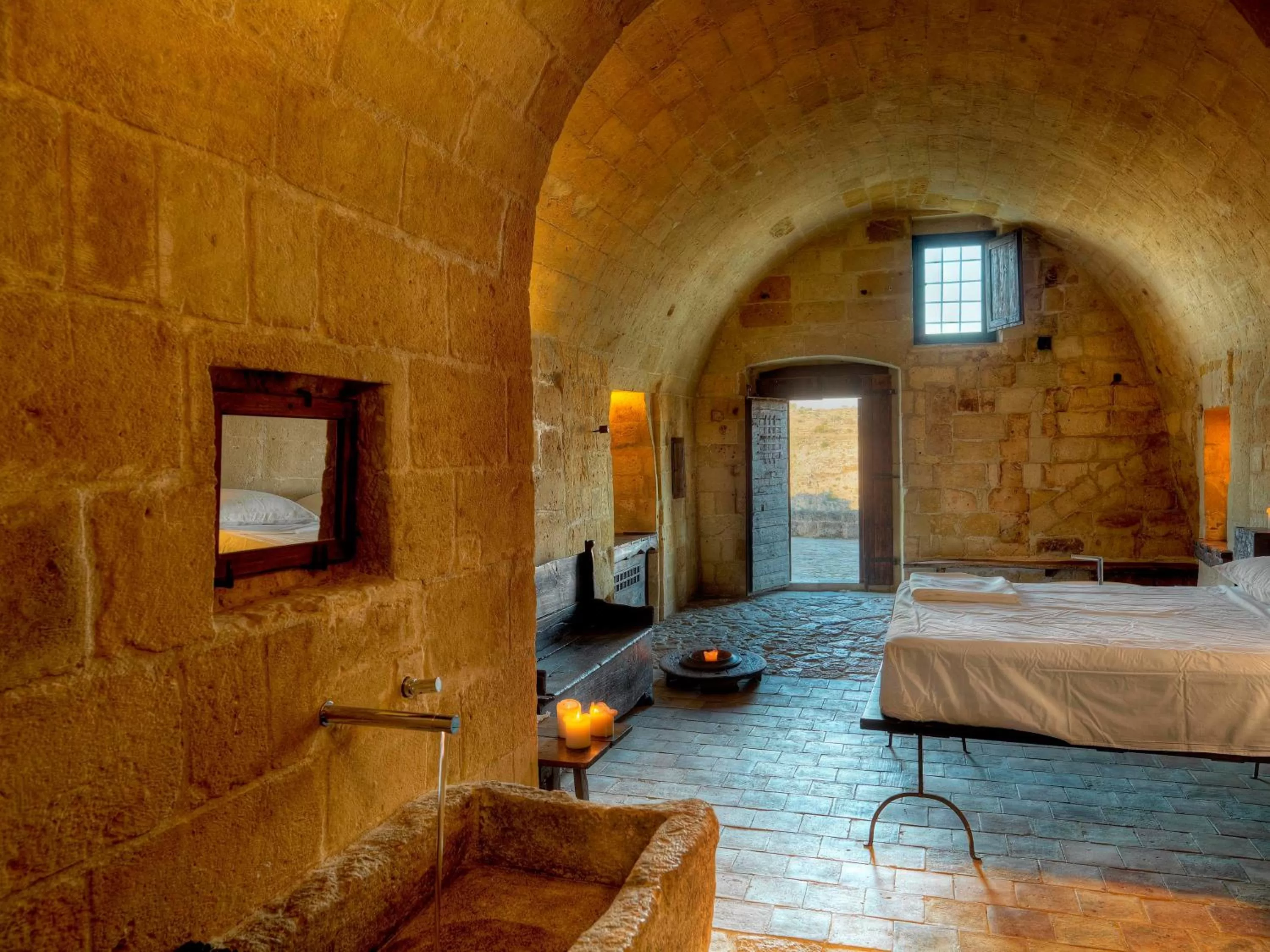 Photo of the whole room, Bed in Sextantio Le Grotte Della Civita
