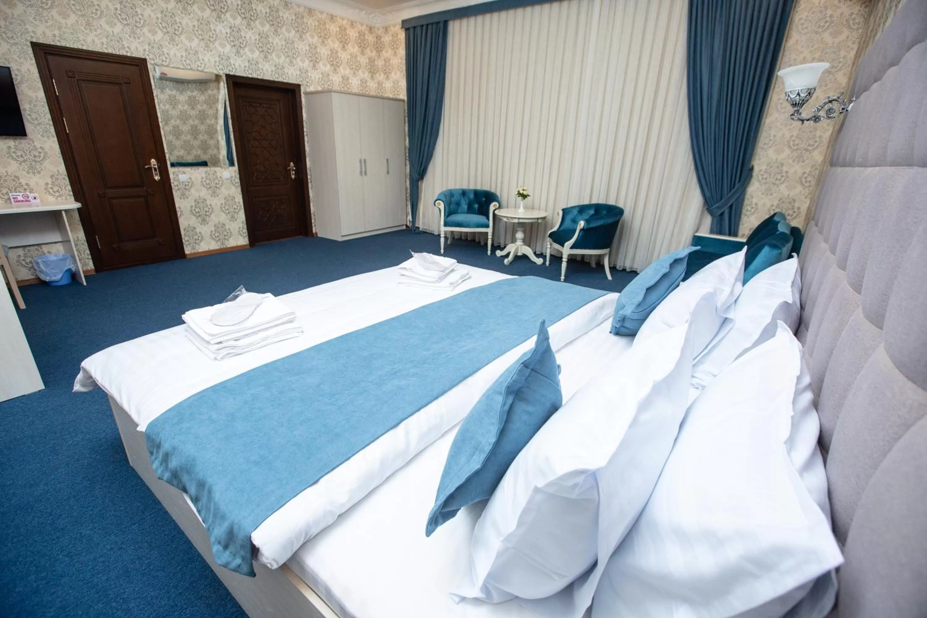 Bed in Mirzo Boutique Hotel