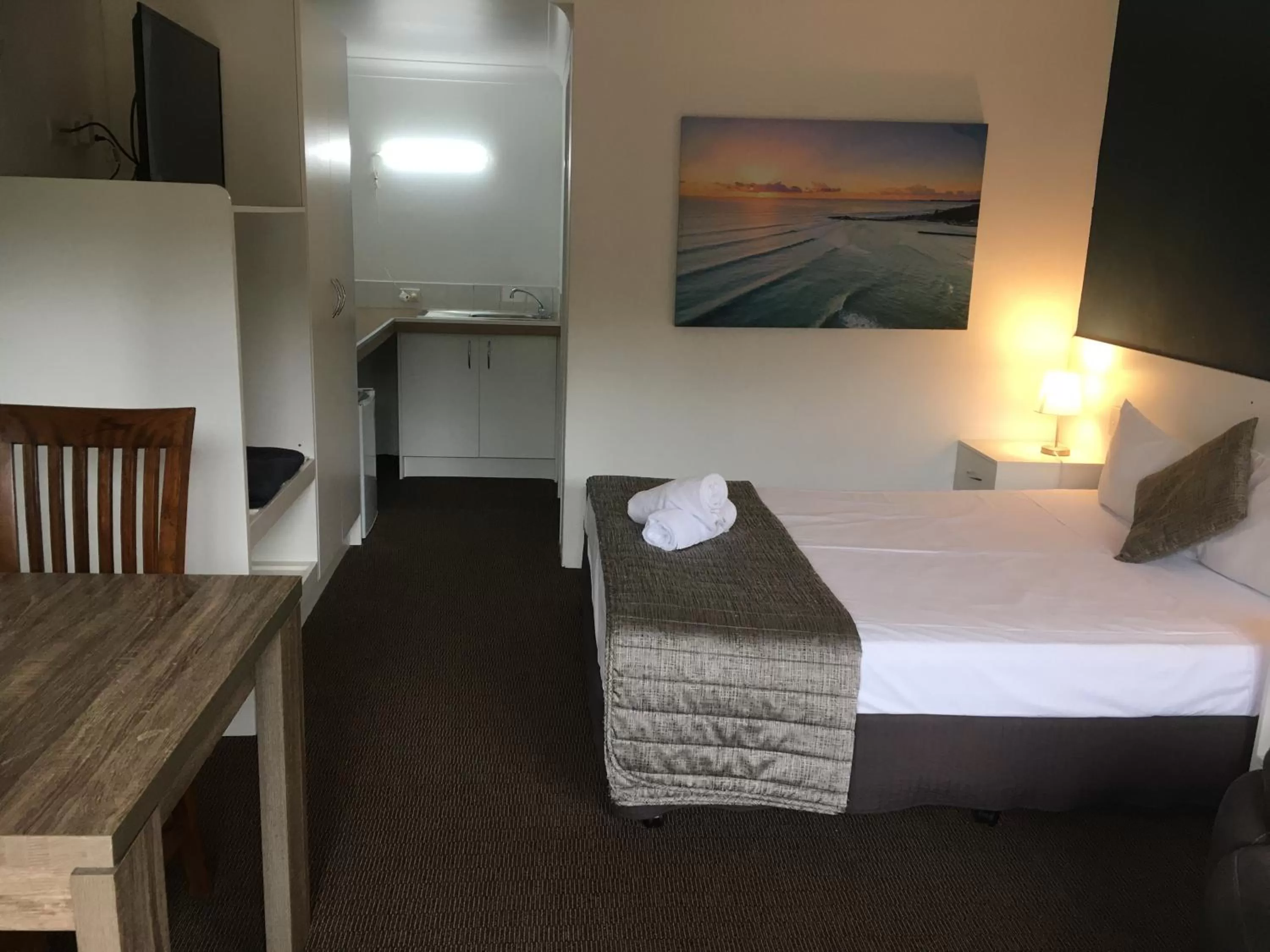 Bed in Blue Pelican Motel