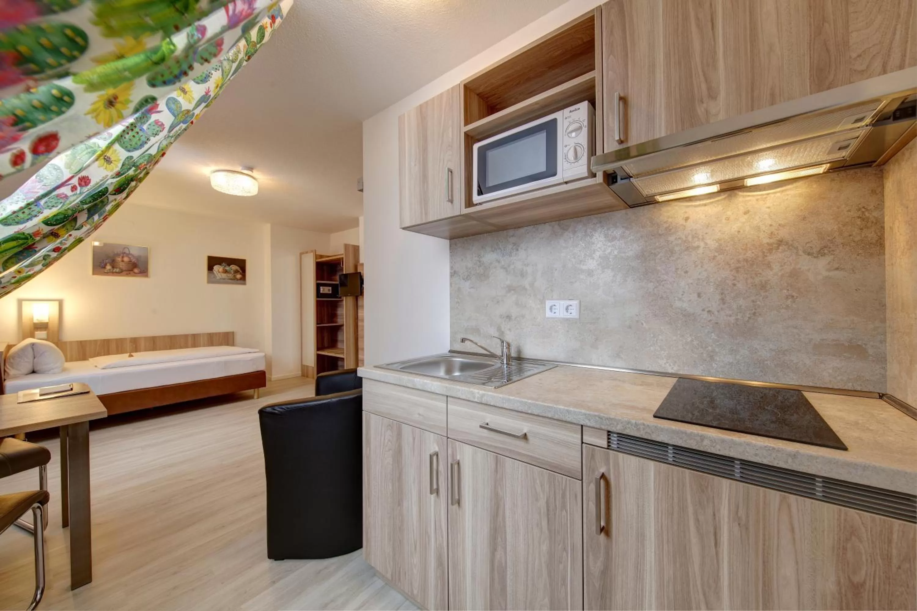 Bed in Aparthotel Deutschmeister