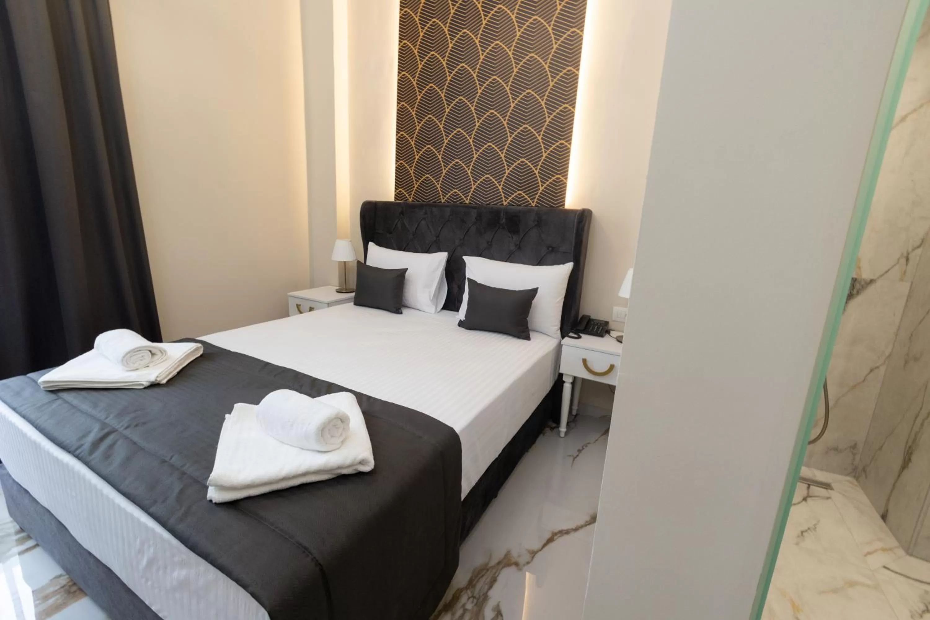 Bed in Modern Revival Luxury Hotel