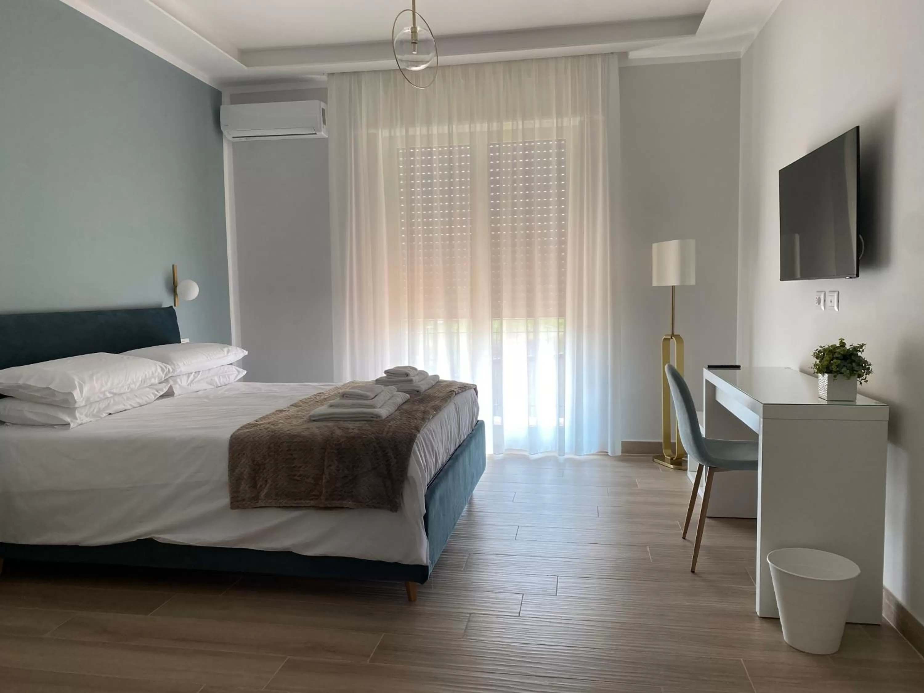 Bed in Luna Nuova Suites