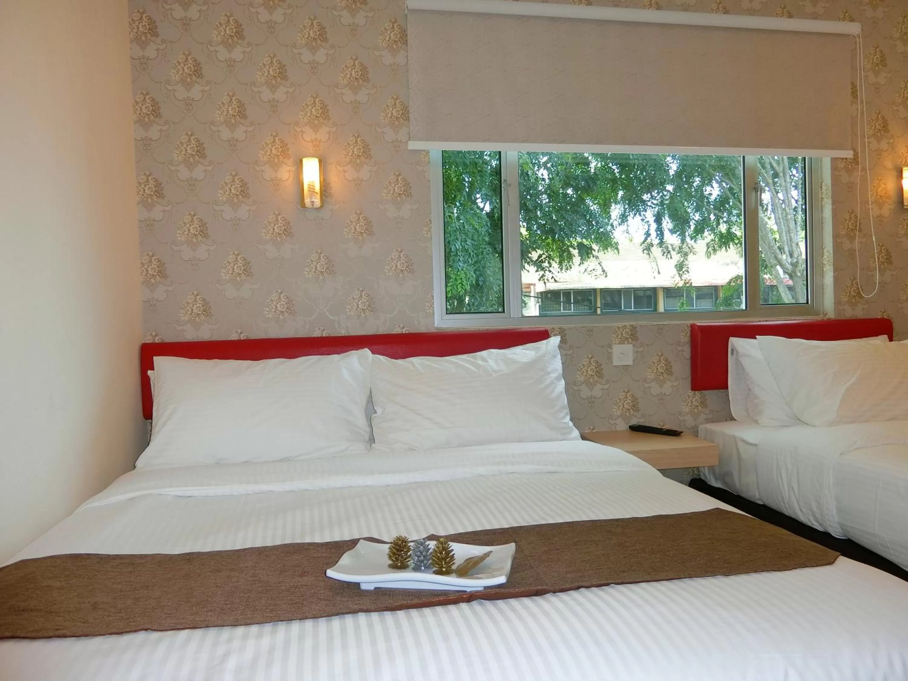 Bed in Carlsun Hotel