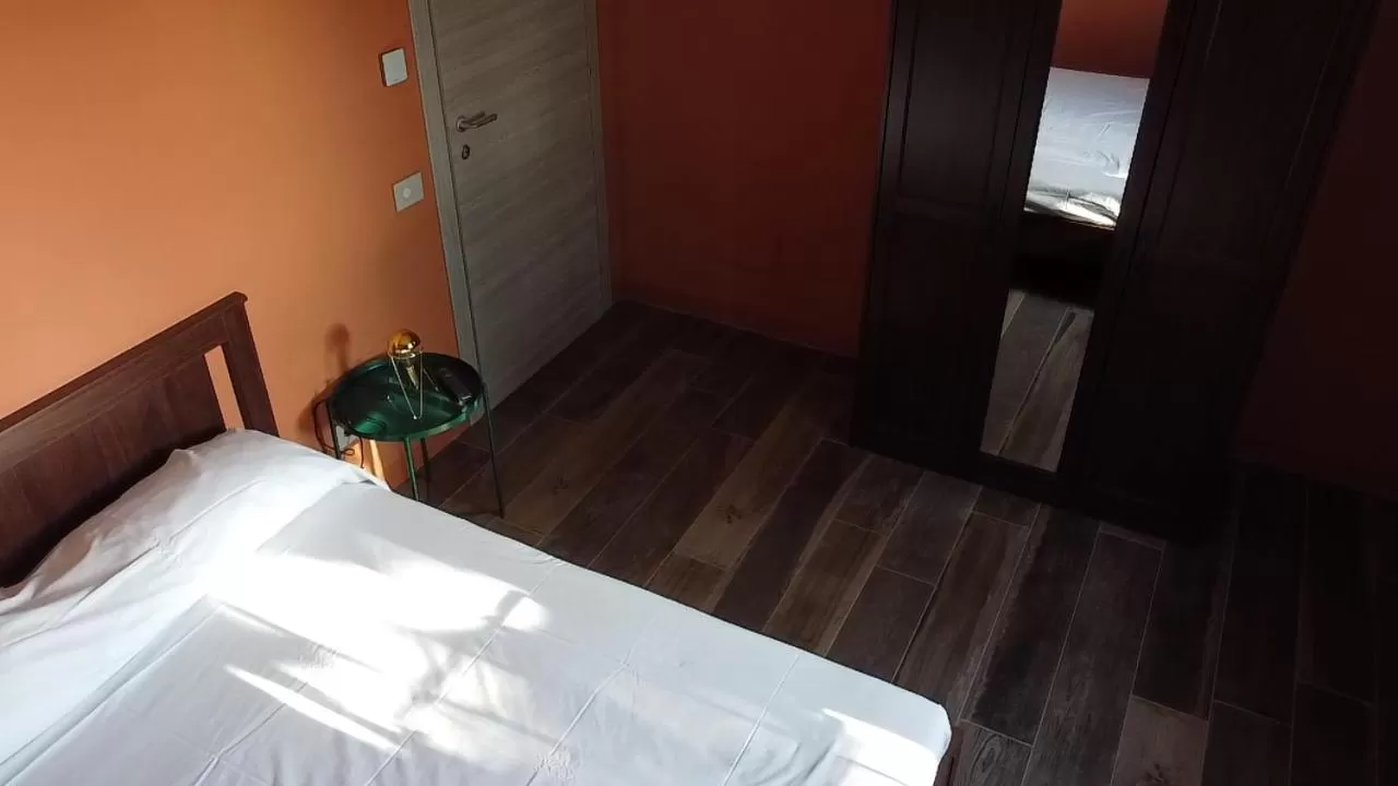 Bed in Sala dell Estate Guest House