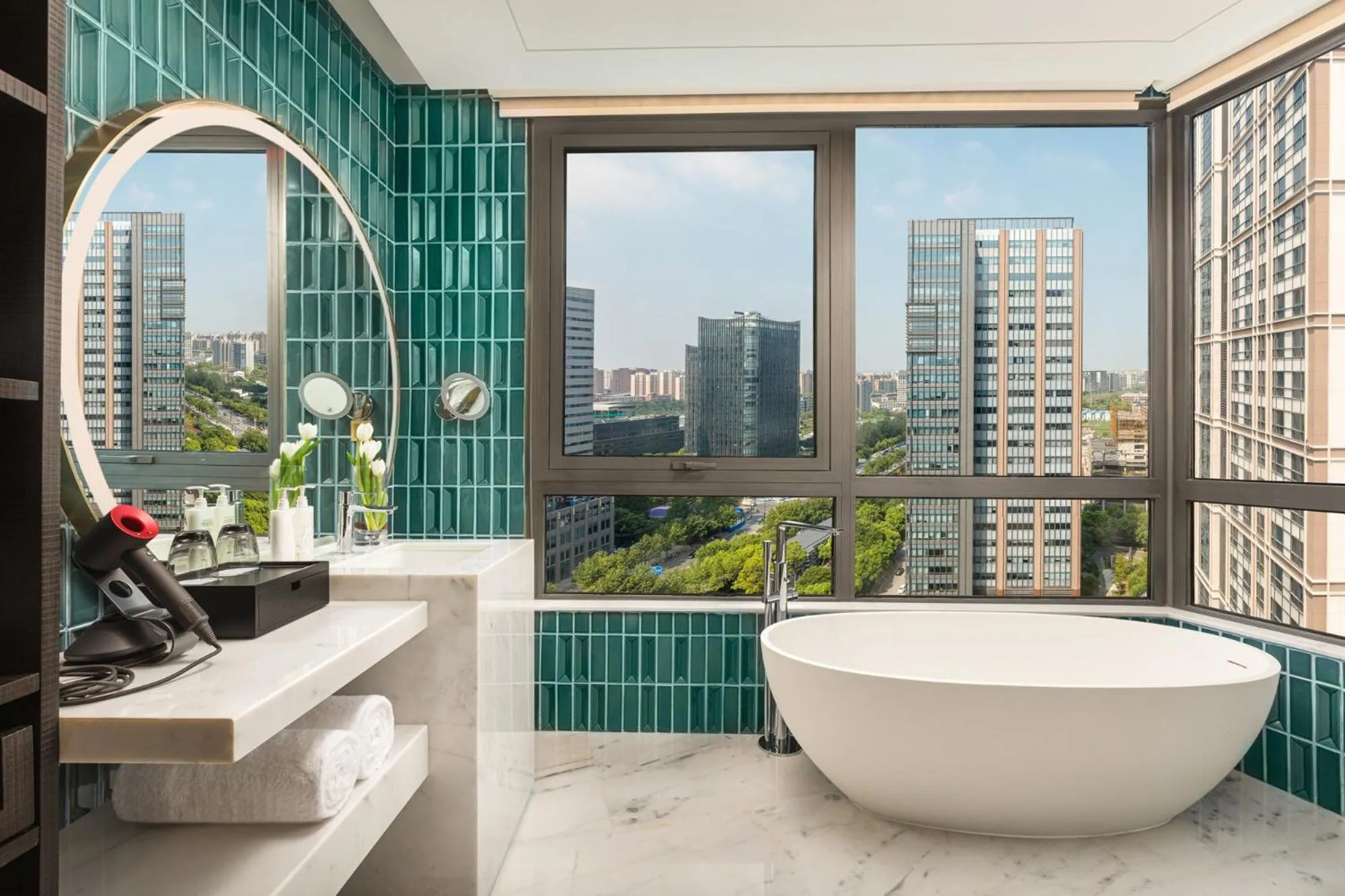 Bathroom in HUALUXE Shanghai Changfeng Park by IHG