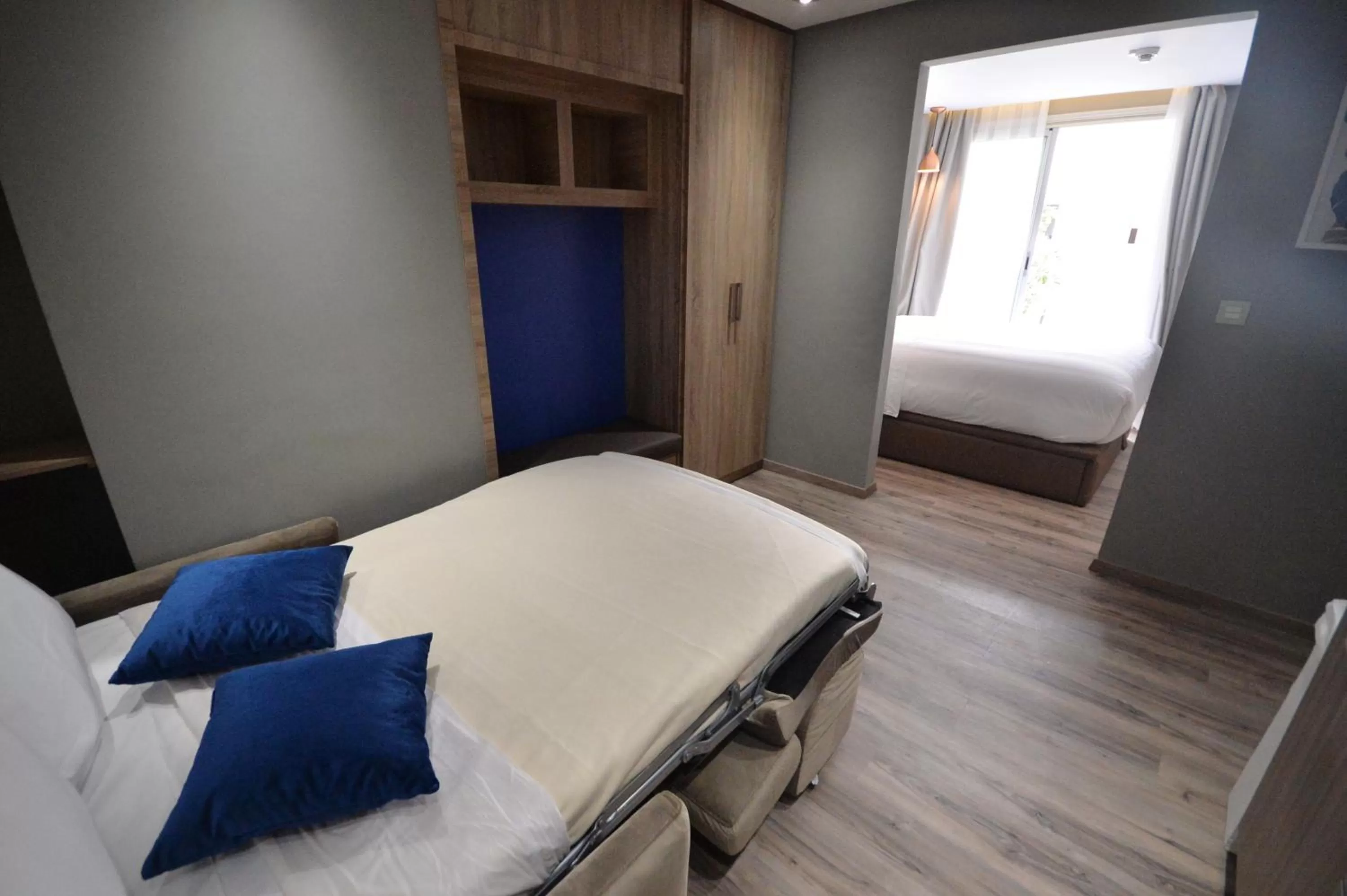 Bed in Le 22 Appart'Hotel