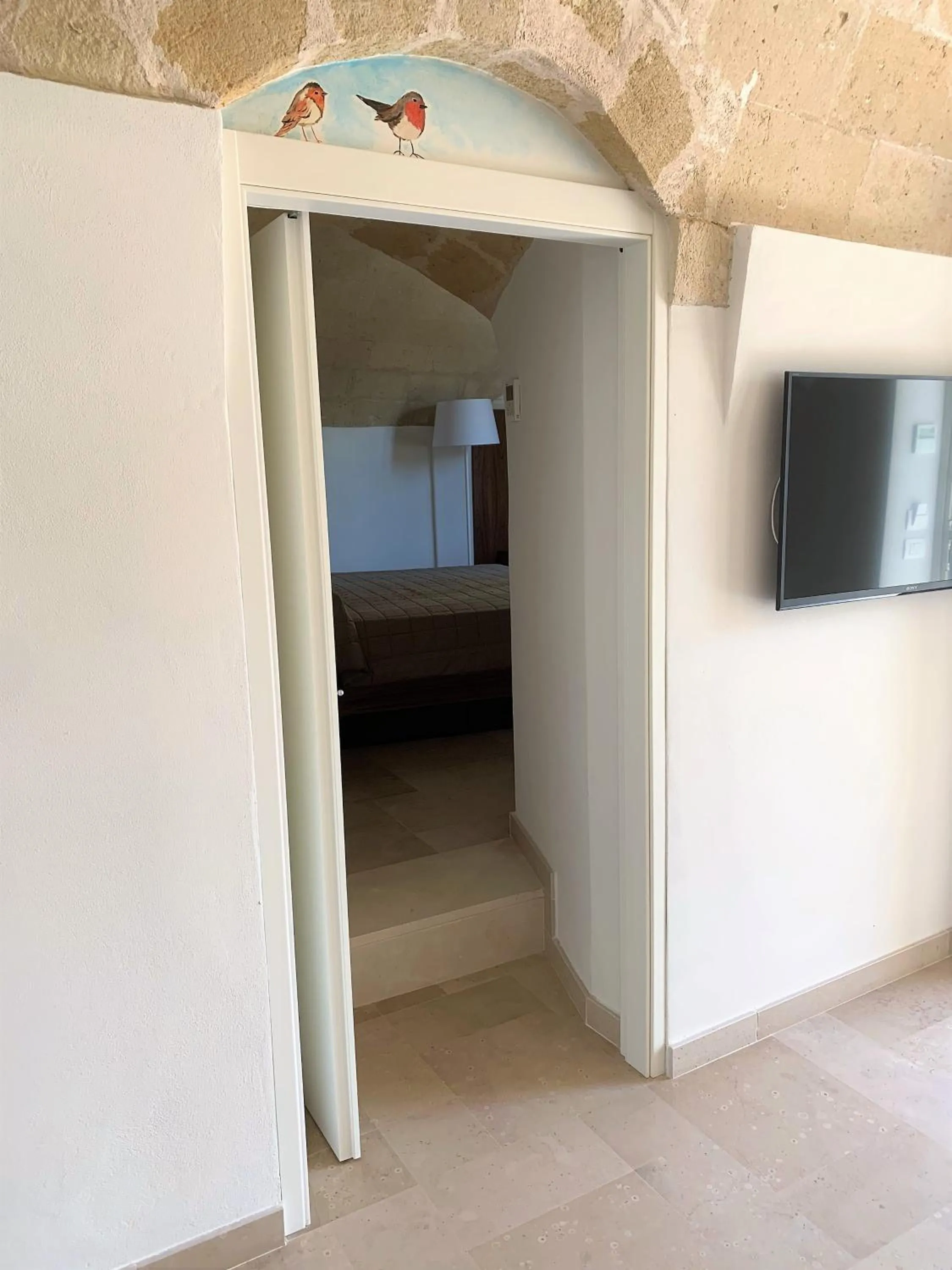 Communal lounge/ TV room in Albergo Del Sedile