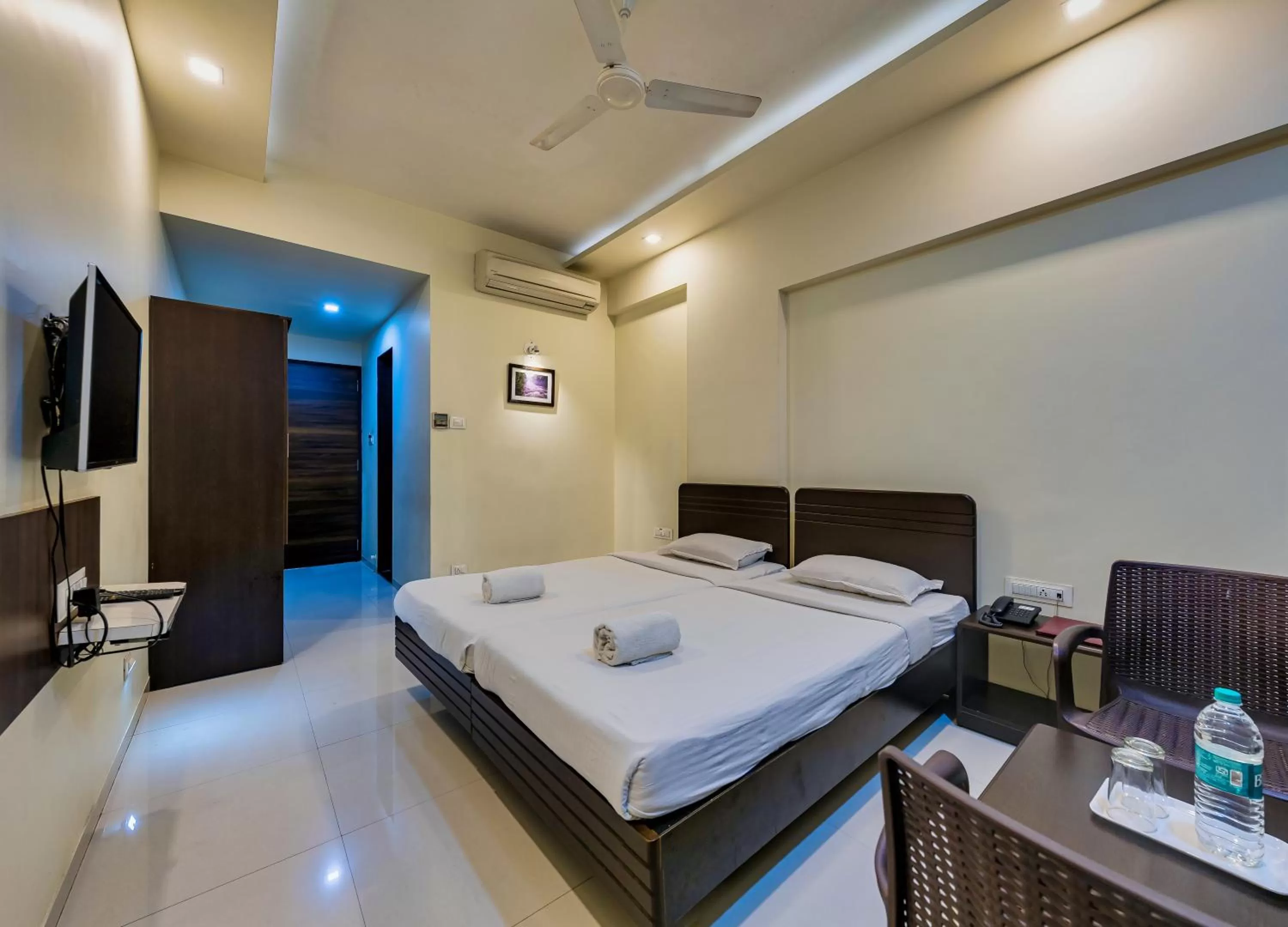 Photo of the whole room, Bed in Hotel Galaxy Inn Kolhapur