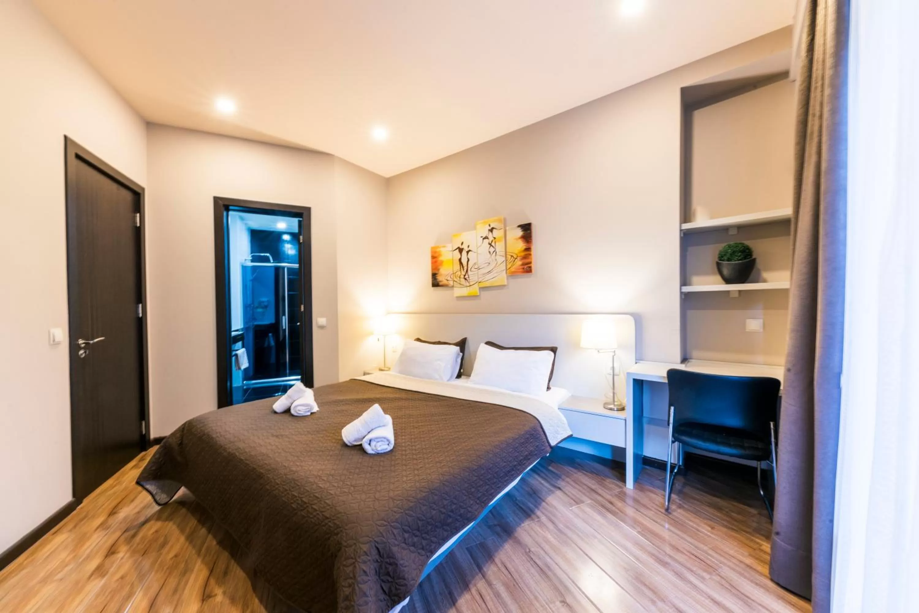 Bed in Sani Apart Hotel