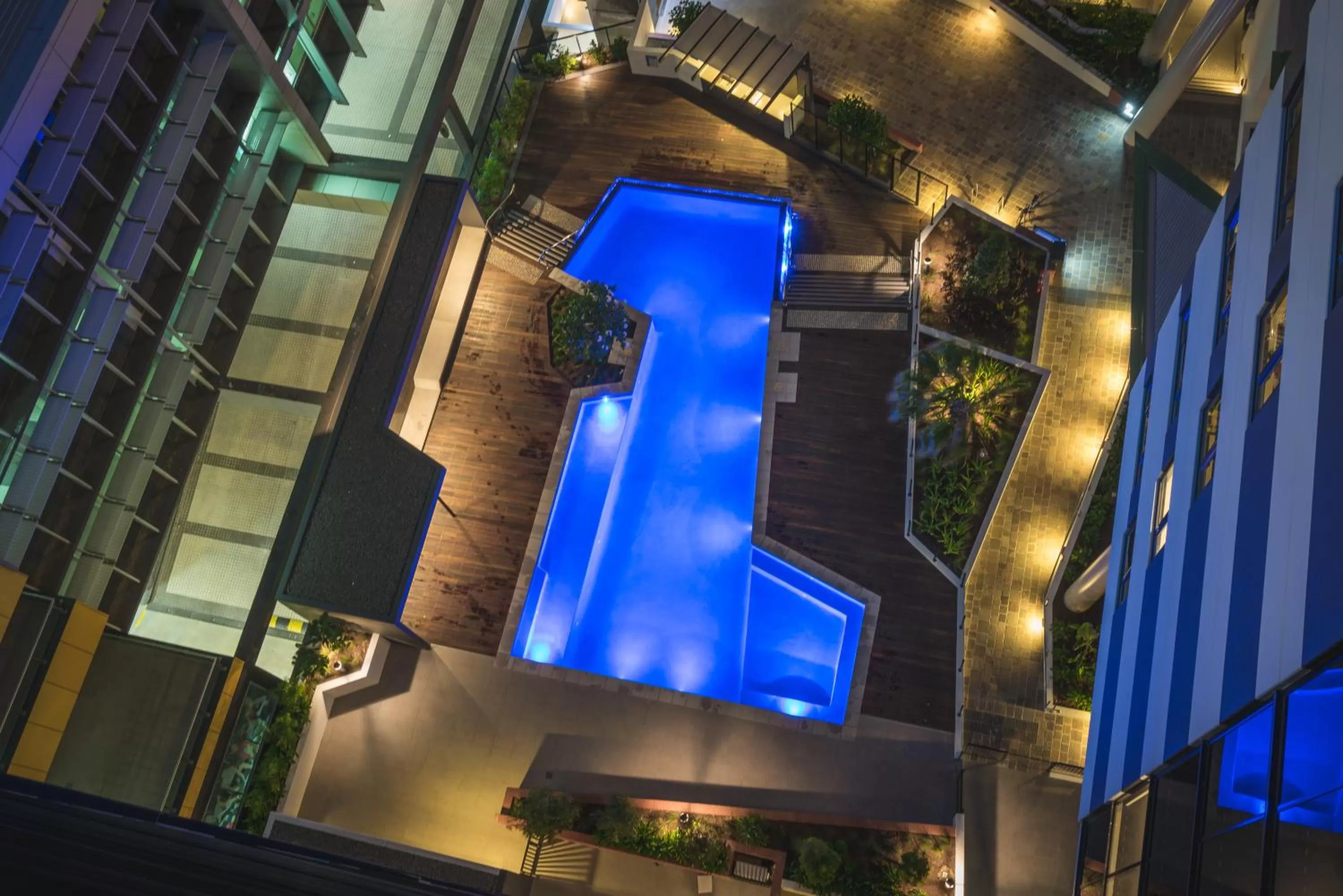 Swimming pool in Arena Apartments by CLLIX