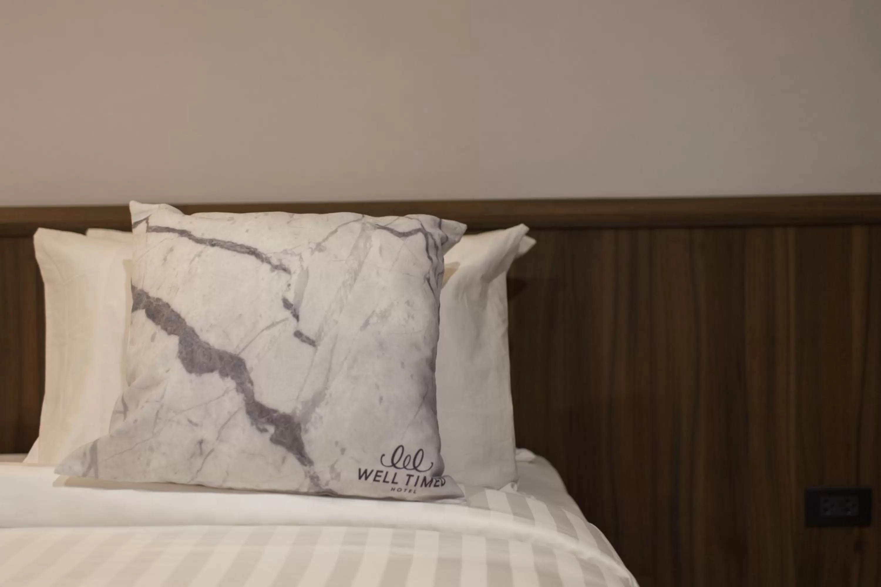 Bed in Well Timed Hotel