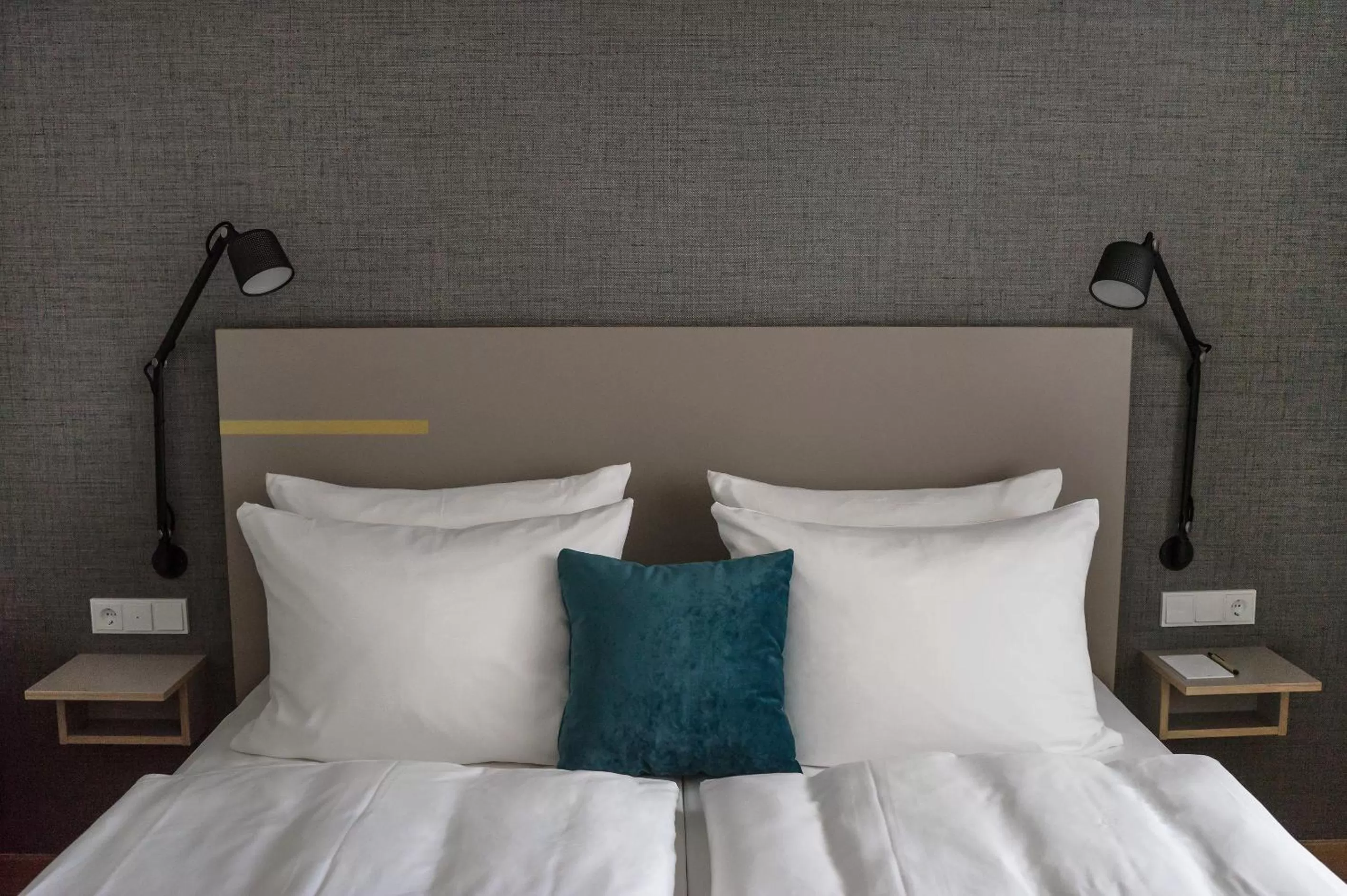 Bed in Vienna House by Wyndham MQ Kronberg