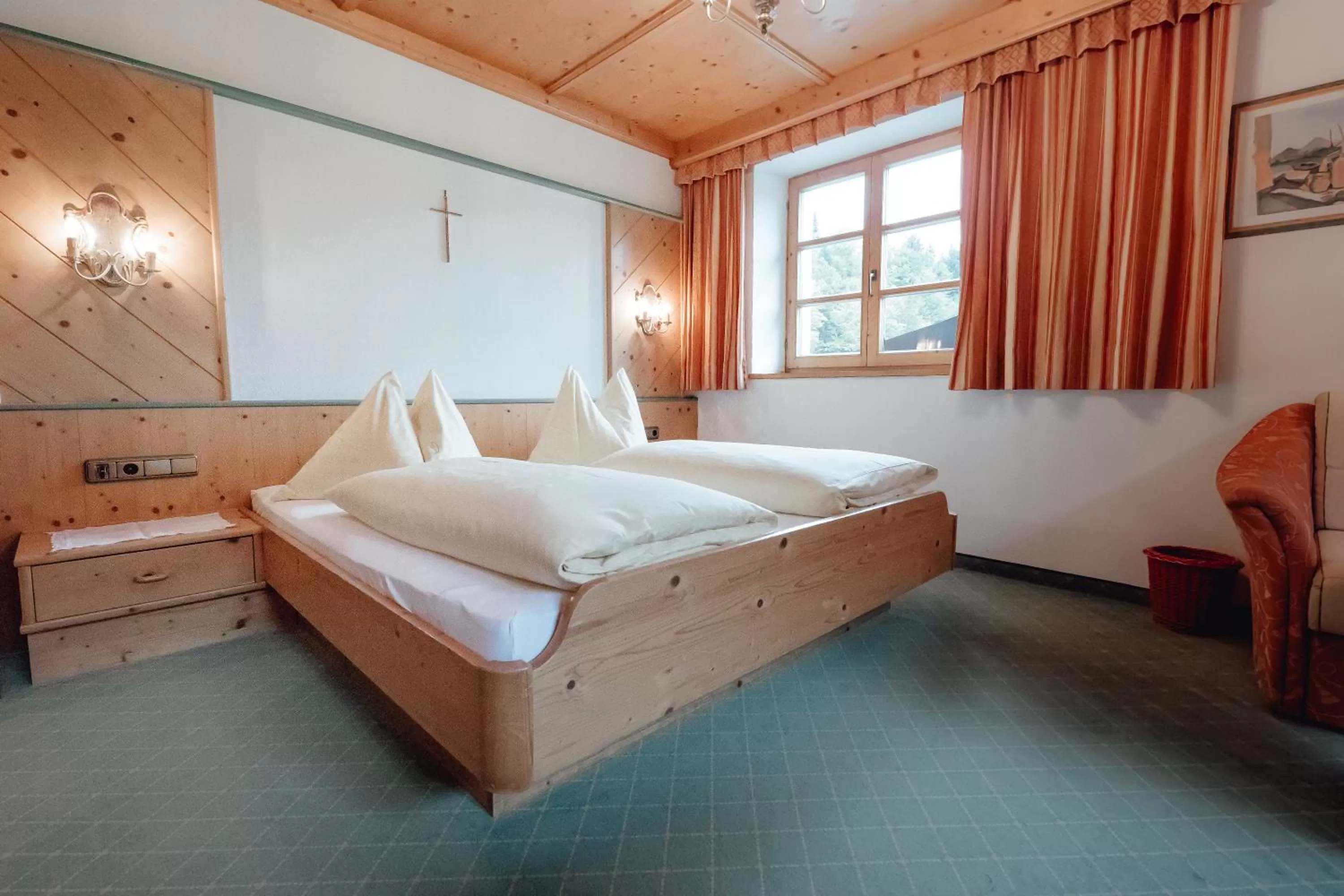 Bed in Zimmer & Ferienwohnungen Dandler