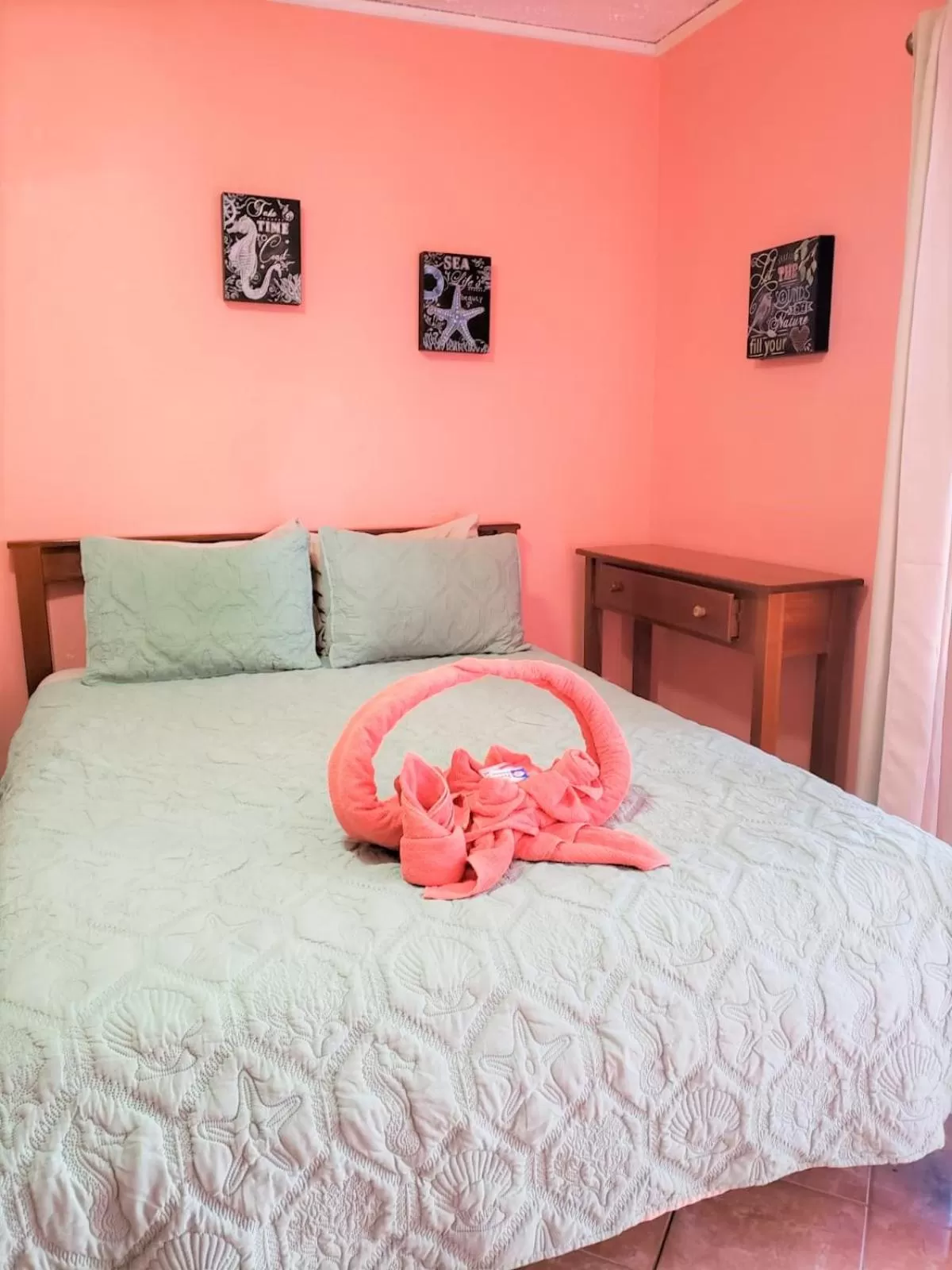 Bed in Beach Side Condos Caye Caulker by CCVH