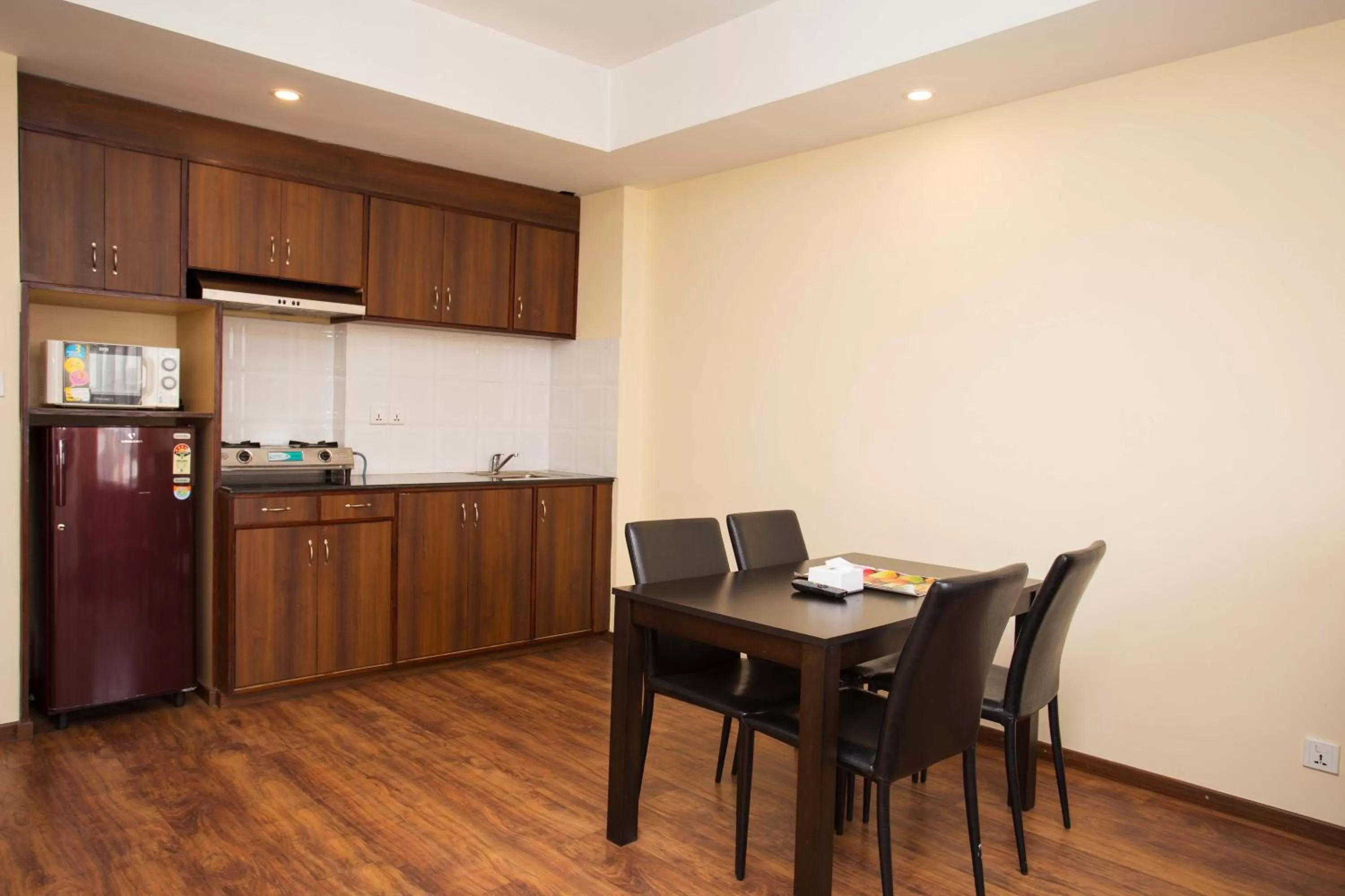 kitchen in Hotel Jay Suites