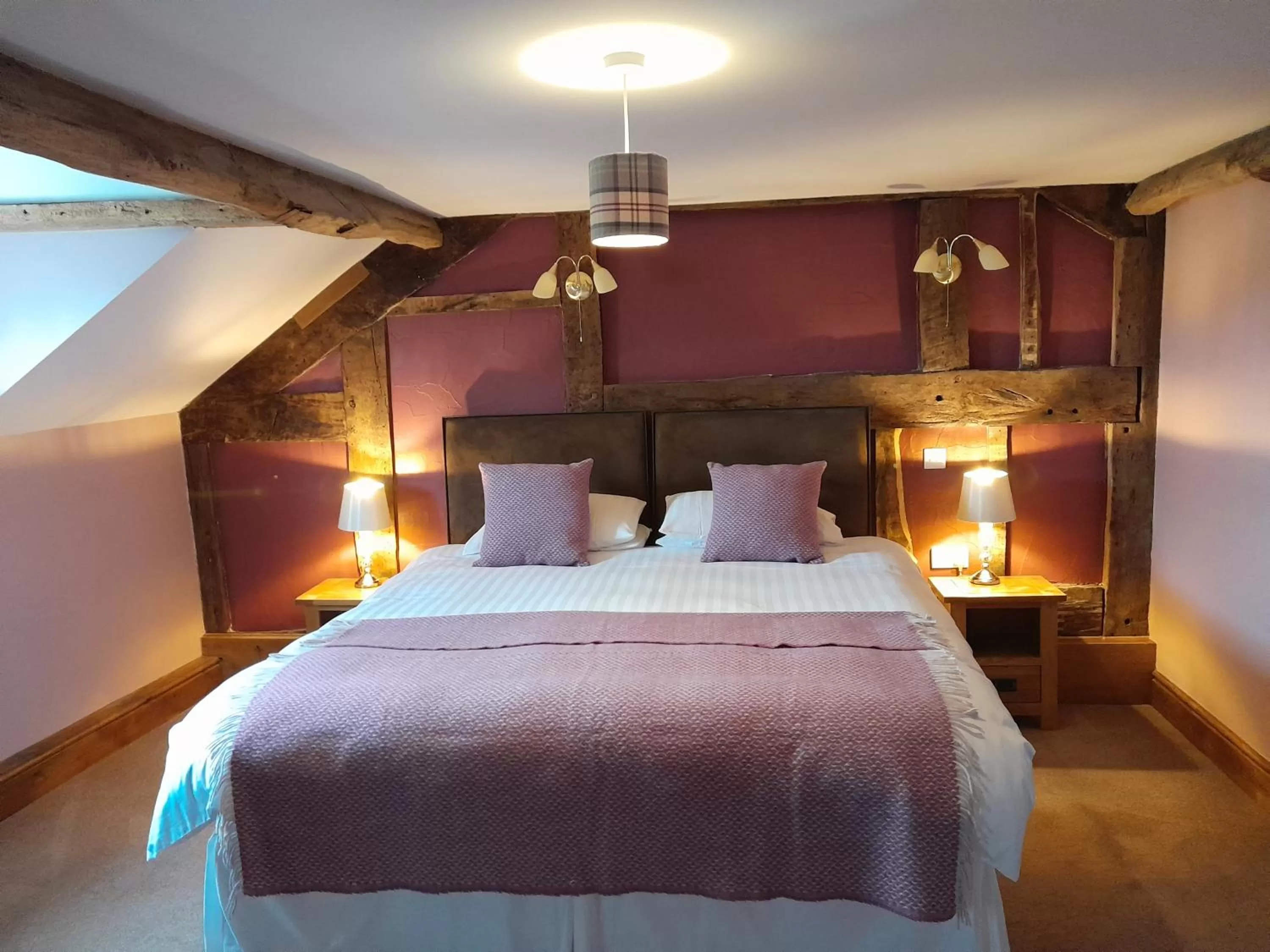 Bed in The Dolfor Inn