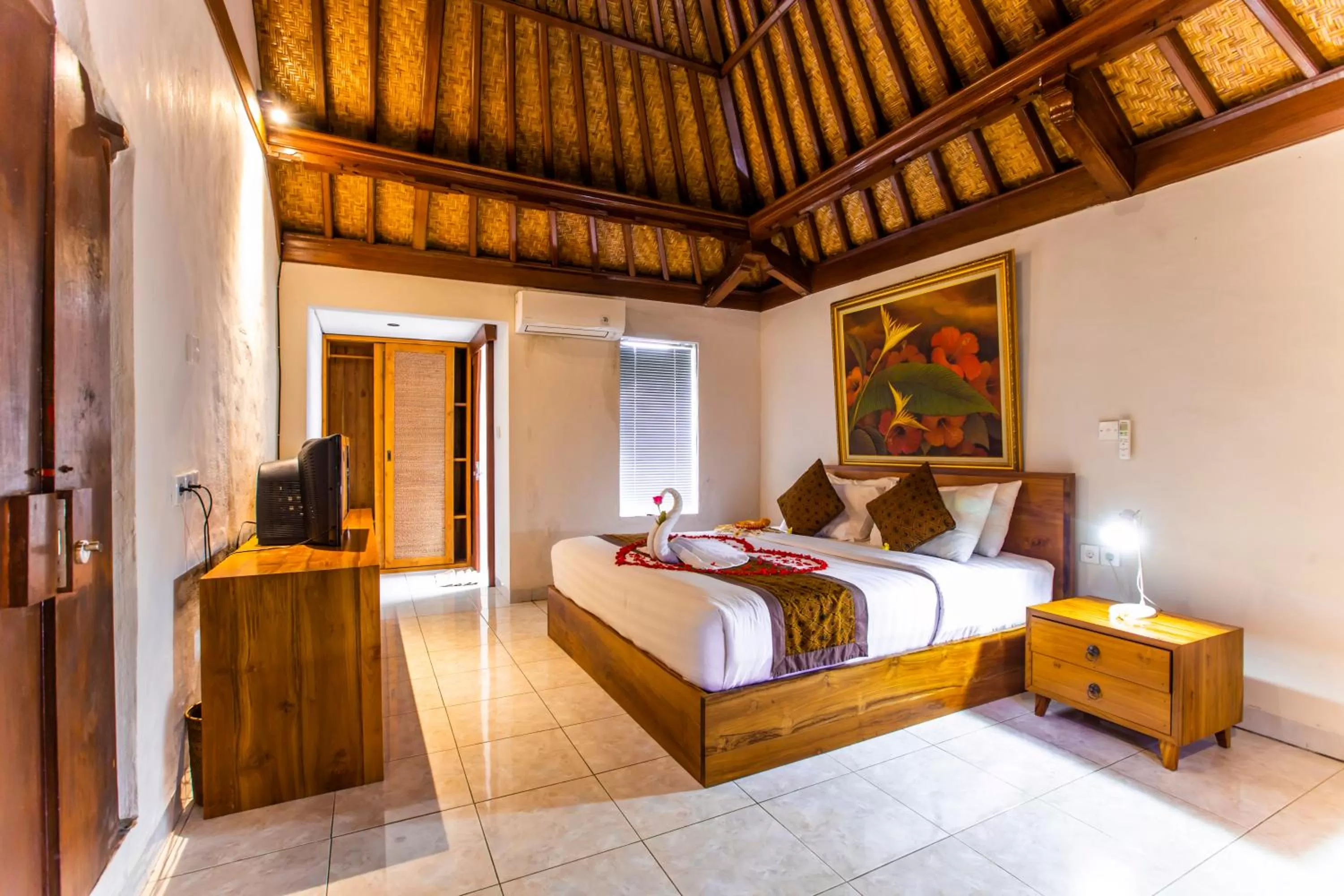 Bed in Seken Cottages Ubud