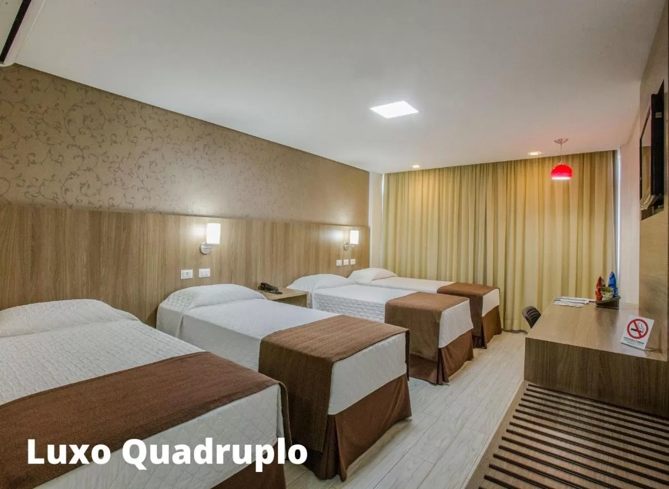 Bed in Foz Presidente Comfort Hotel