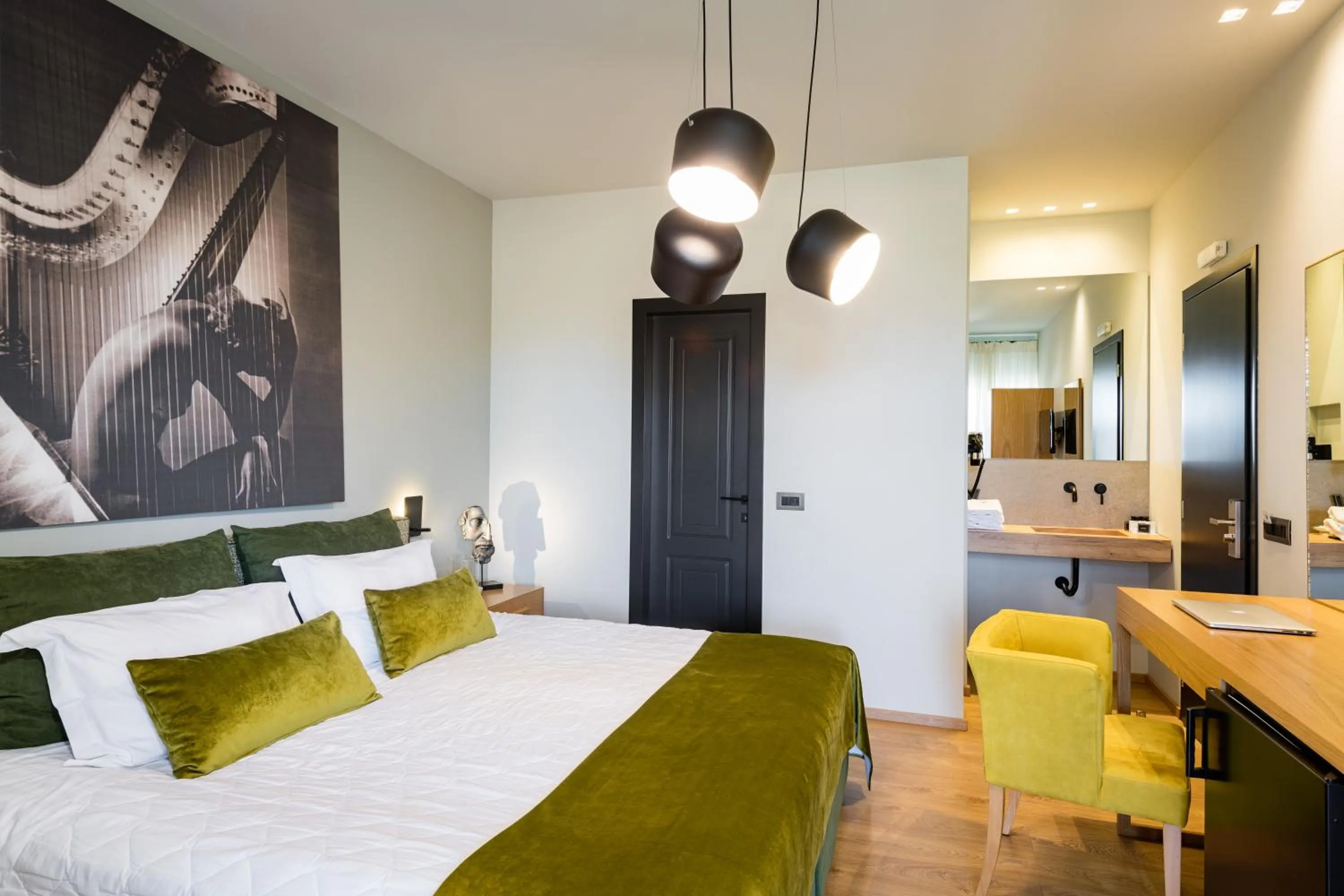 Bed in Anthemion Suites and Villas