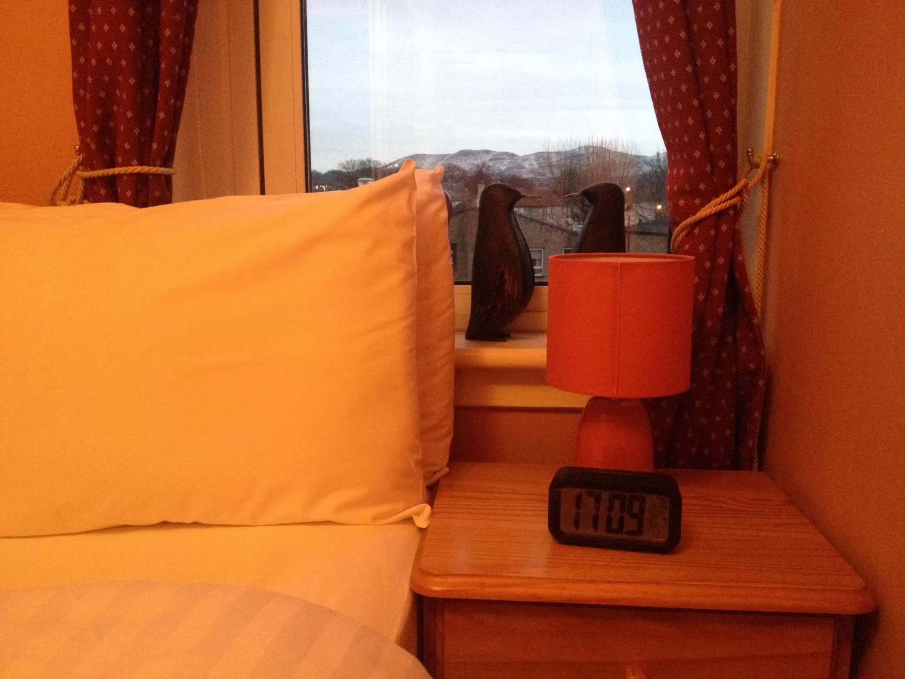 Bed in Twin Lions Hotel