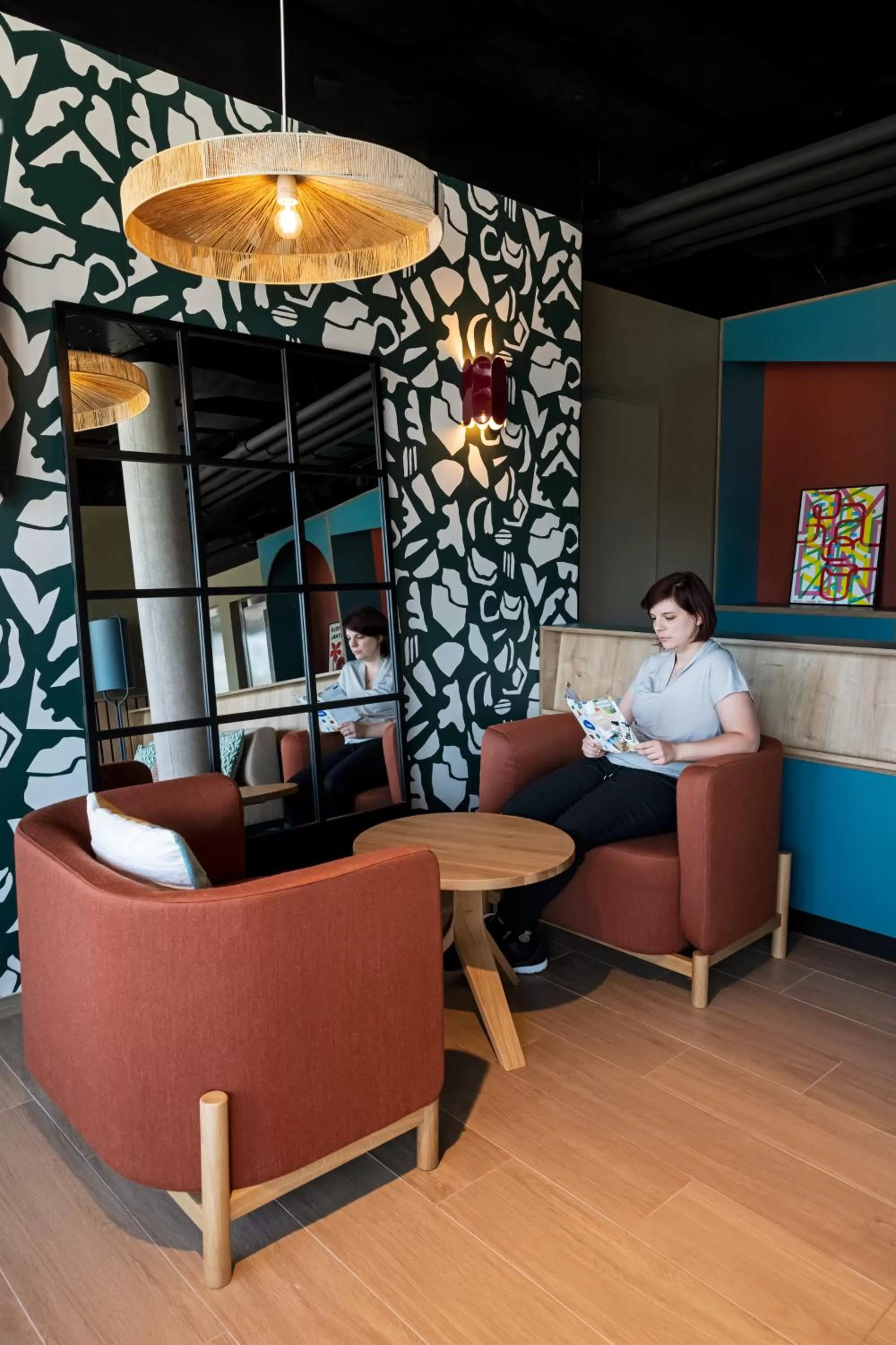 Communal lounge/ TV room in B&B HOTEL Nyon