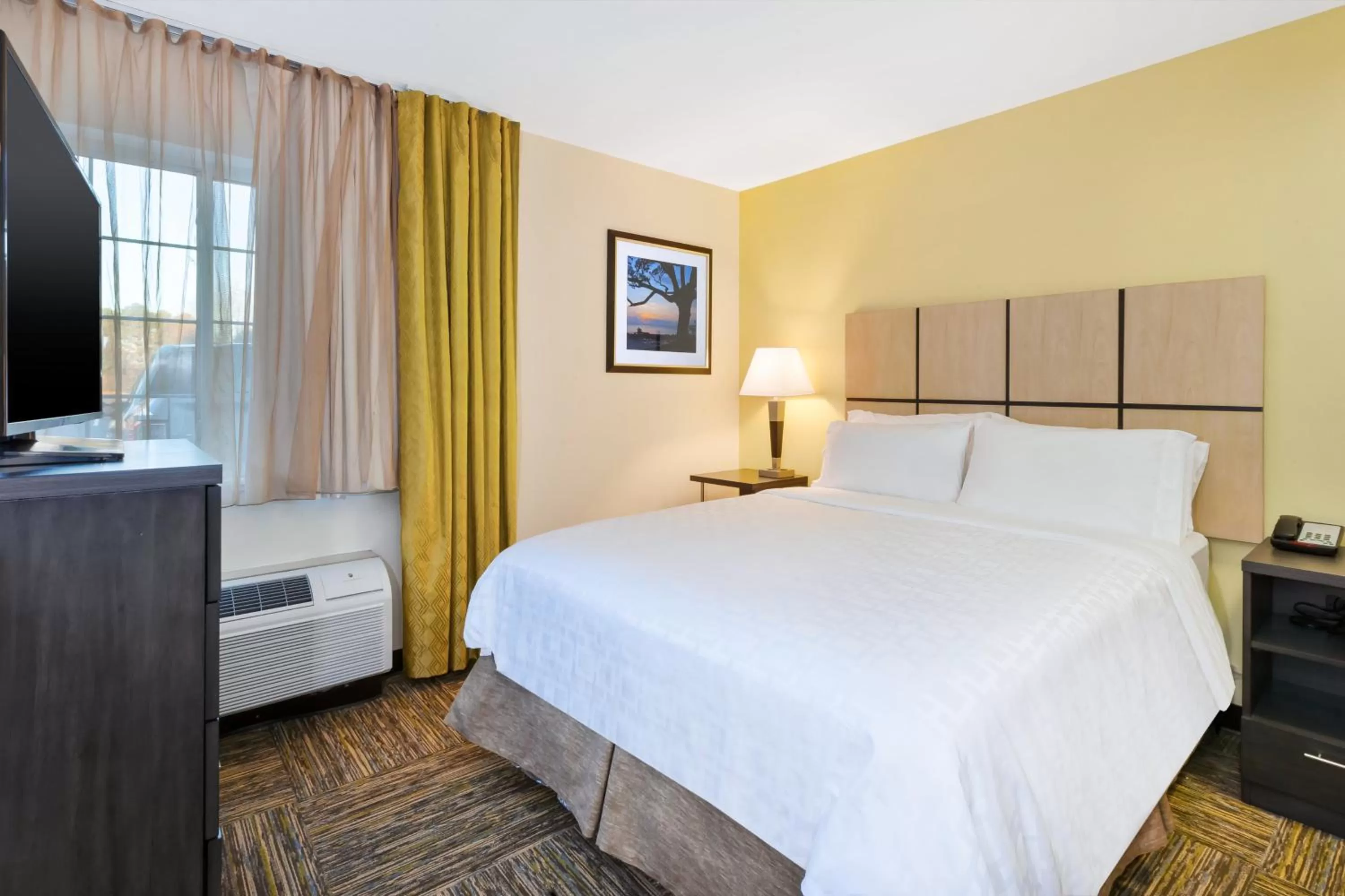 Photo of the whole room, Bed in Candlewood Suites Huntersville-Lake Norman Area by IHG