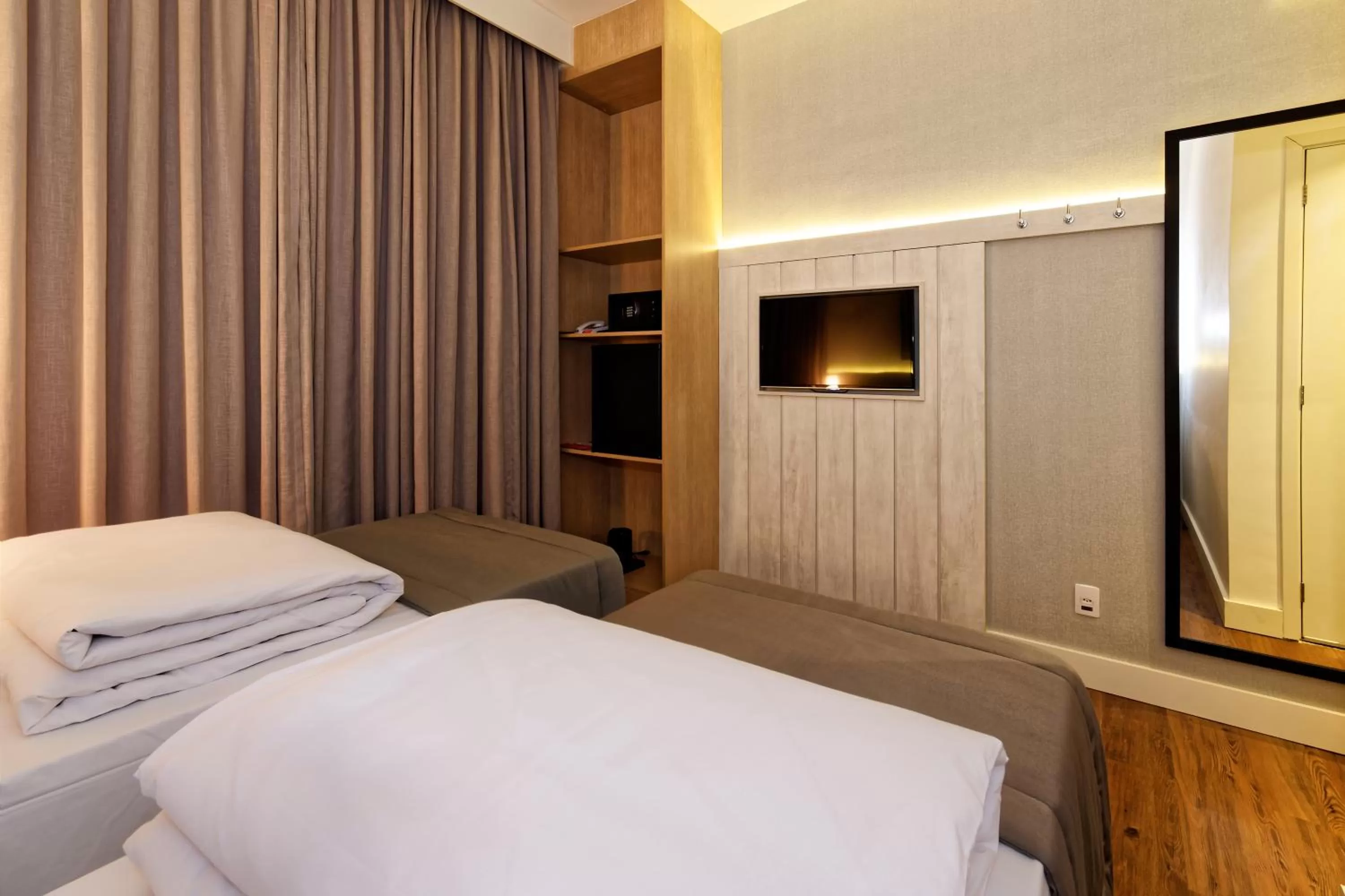 Photo of the whole room, Bed in Ramada Encore Sao Paulo Tiradentes Centro