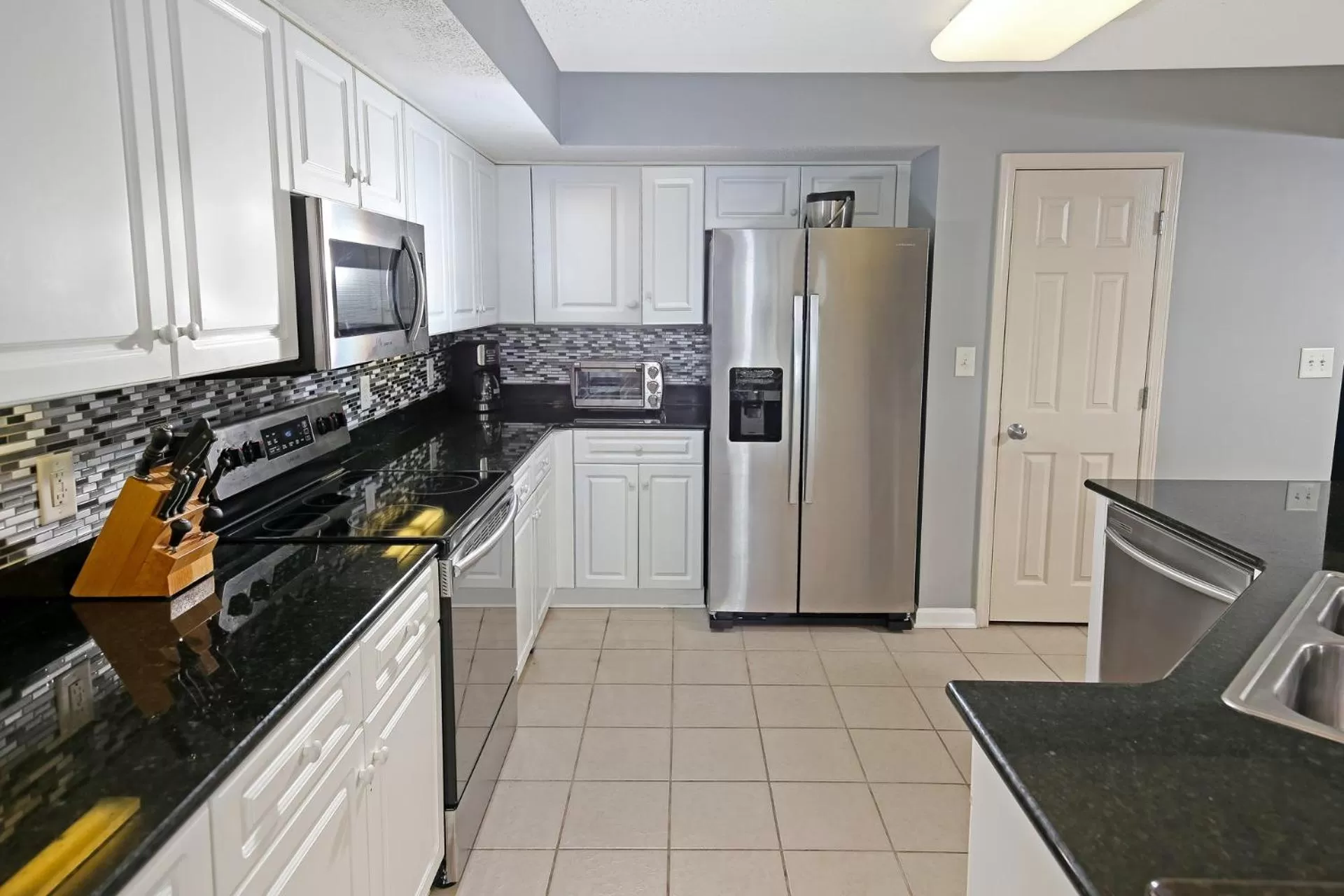 Kitchen or kitchenette in Barefoot Resort Golf & Yacht Club Villas