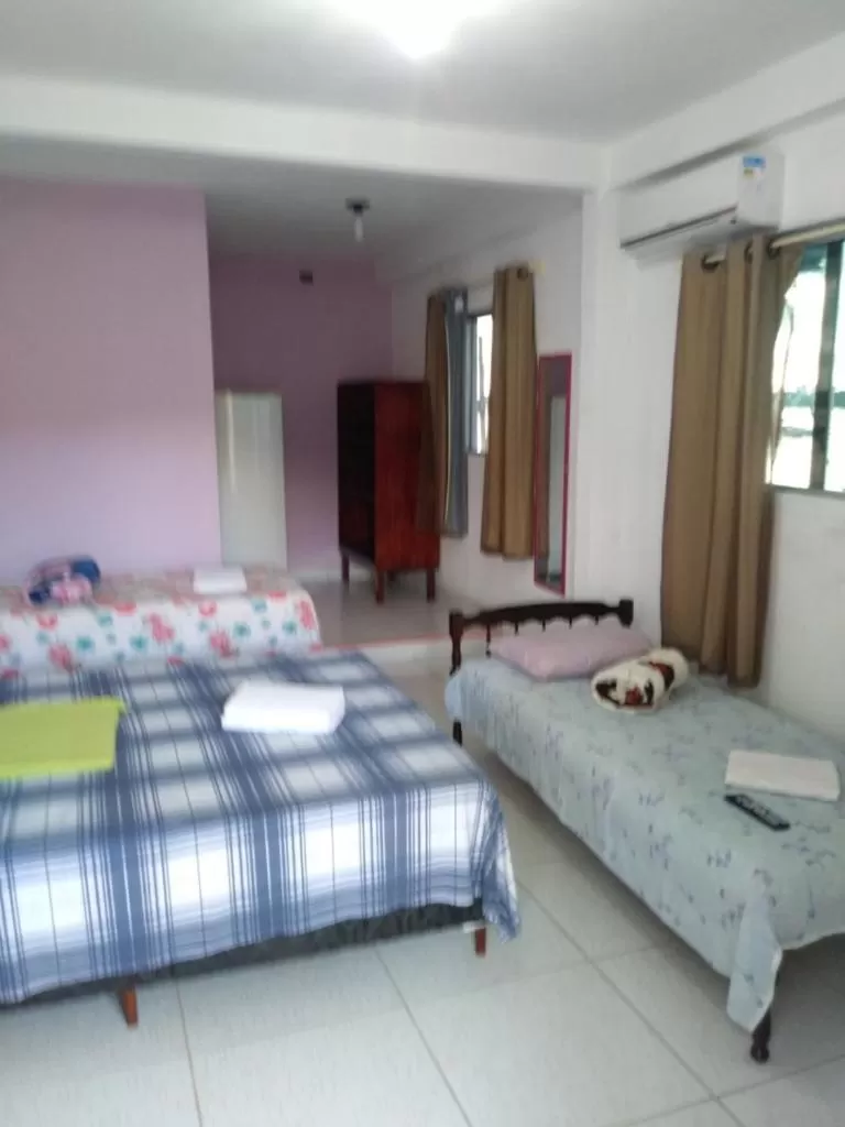 Bed in Pousada dos Ventos