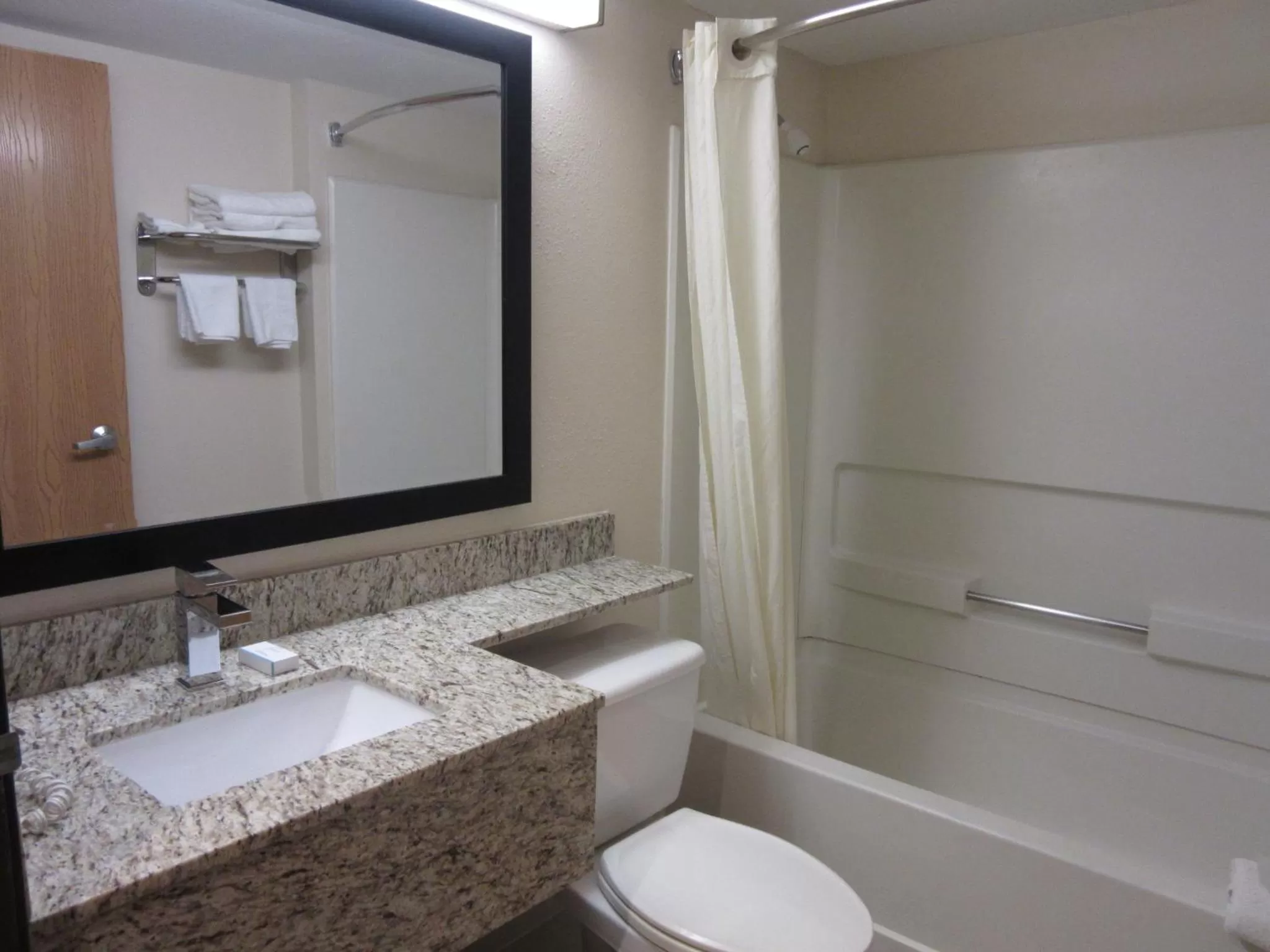 Bathroom in Travelodge by Wyndham Arlington/Dallas Area