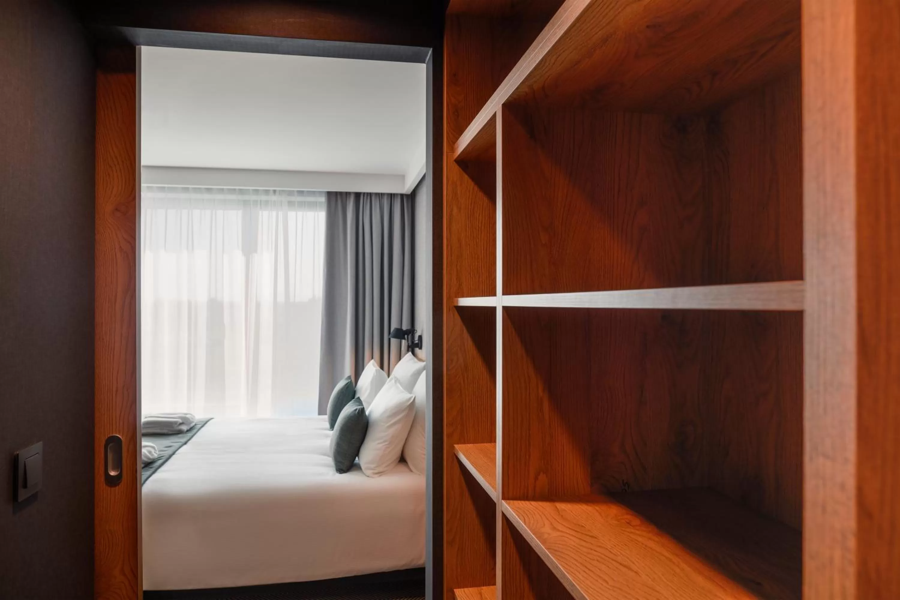 wardrobe, Bed in Q Hotel Plus Wrocław Bielany