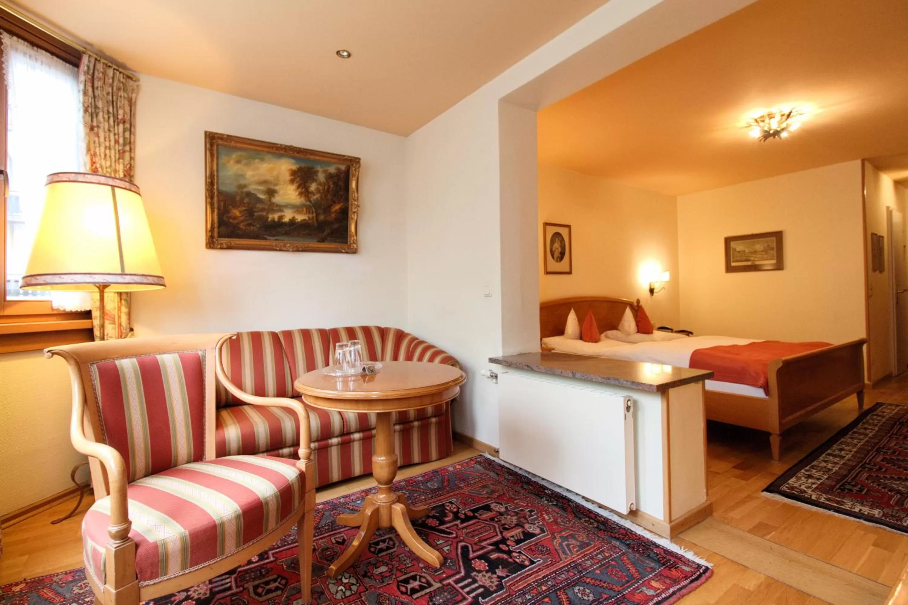 Seating area, Bed in Reindl's Partenkirchener Hof