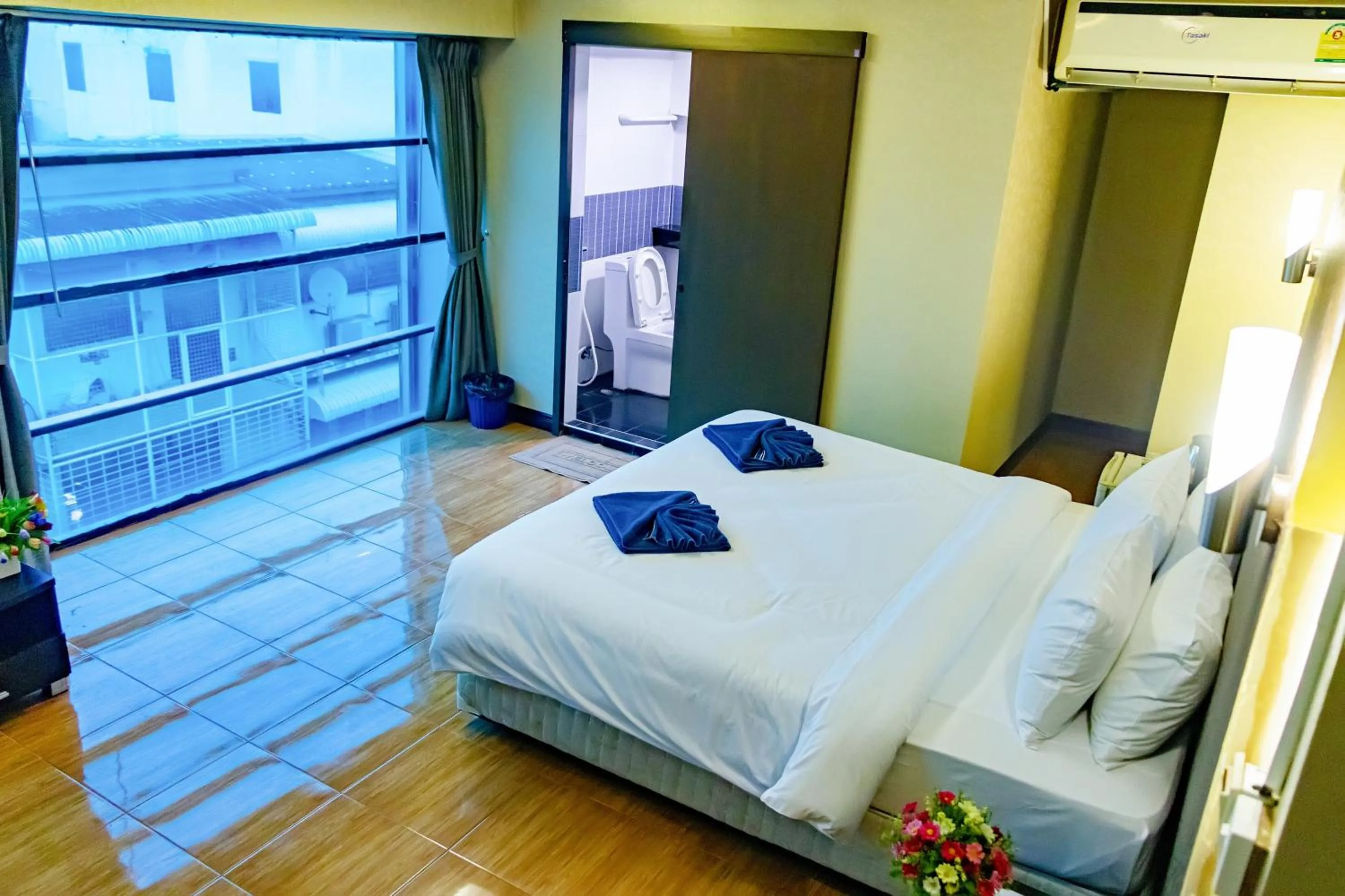 Bed in Visiting Card Hotel & Resort