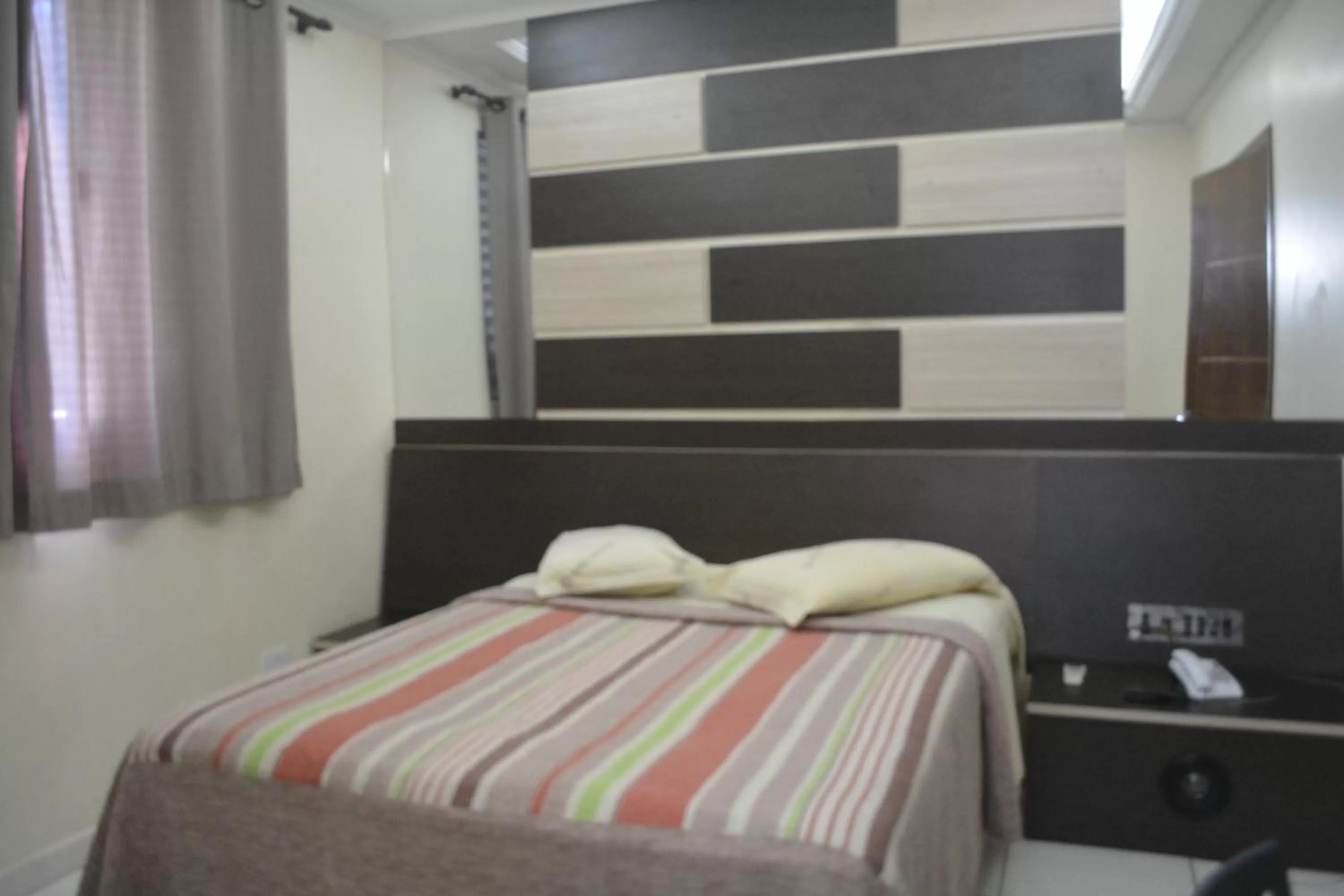 Bed in Hotel Calstar