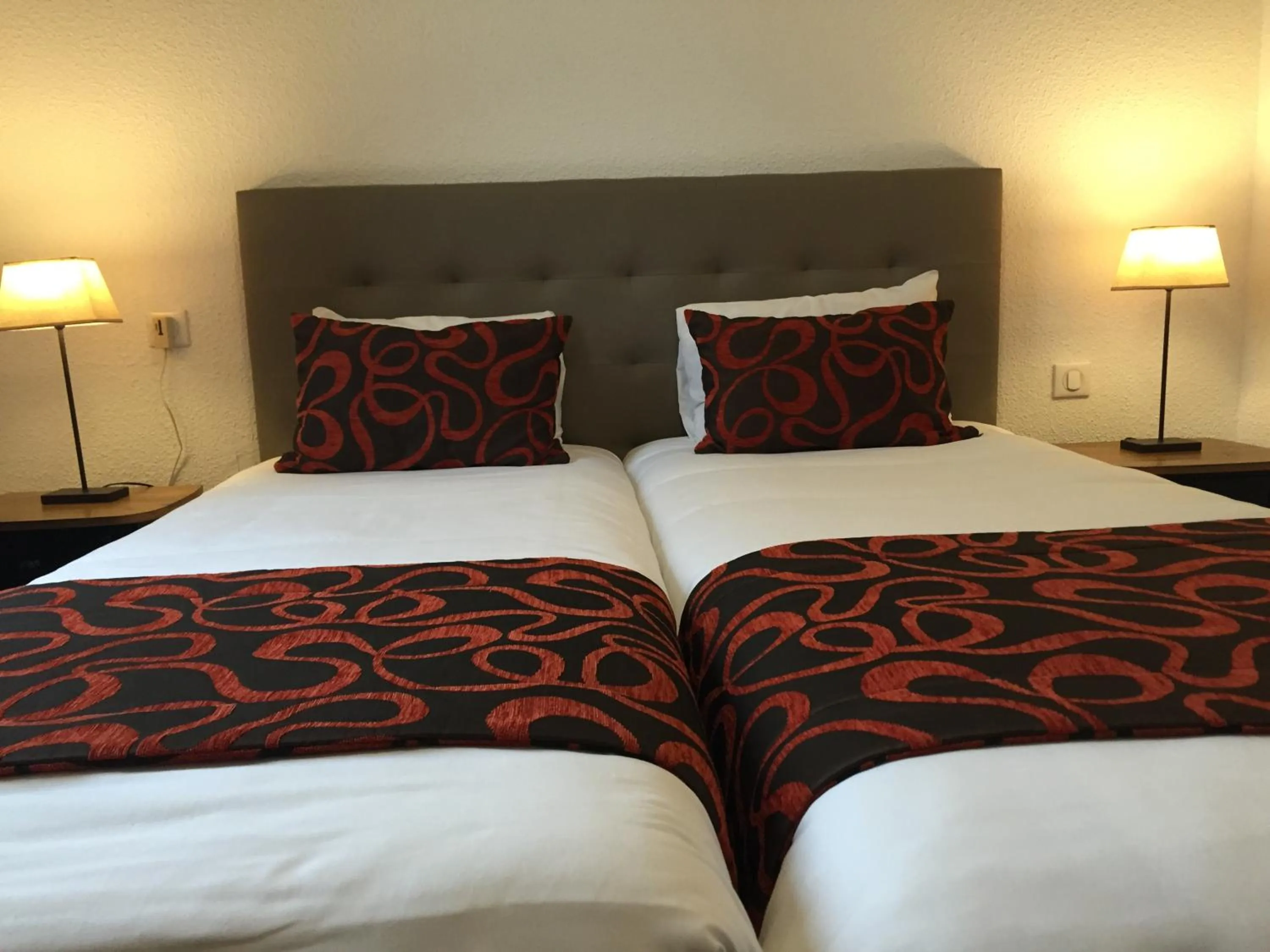 Bed in Hôtel du Moulin