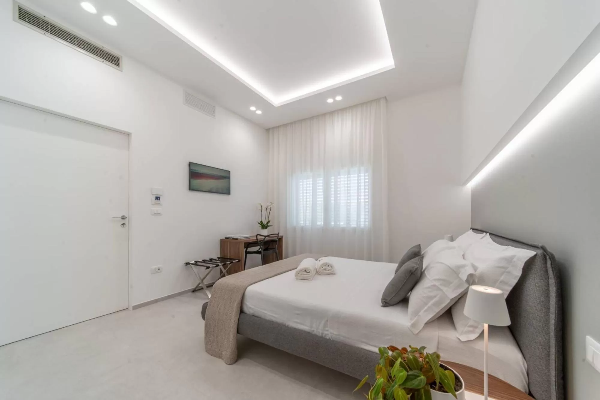 Bed in Daline Holiday Rooms