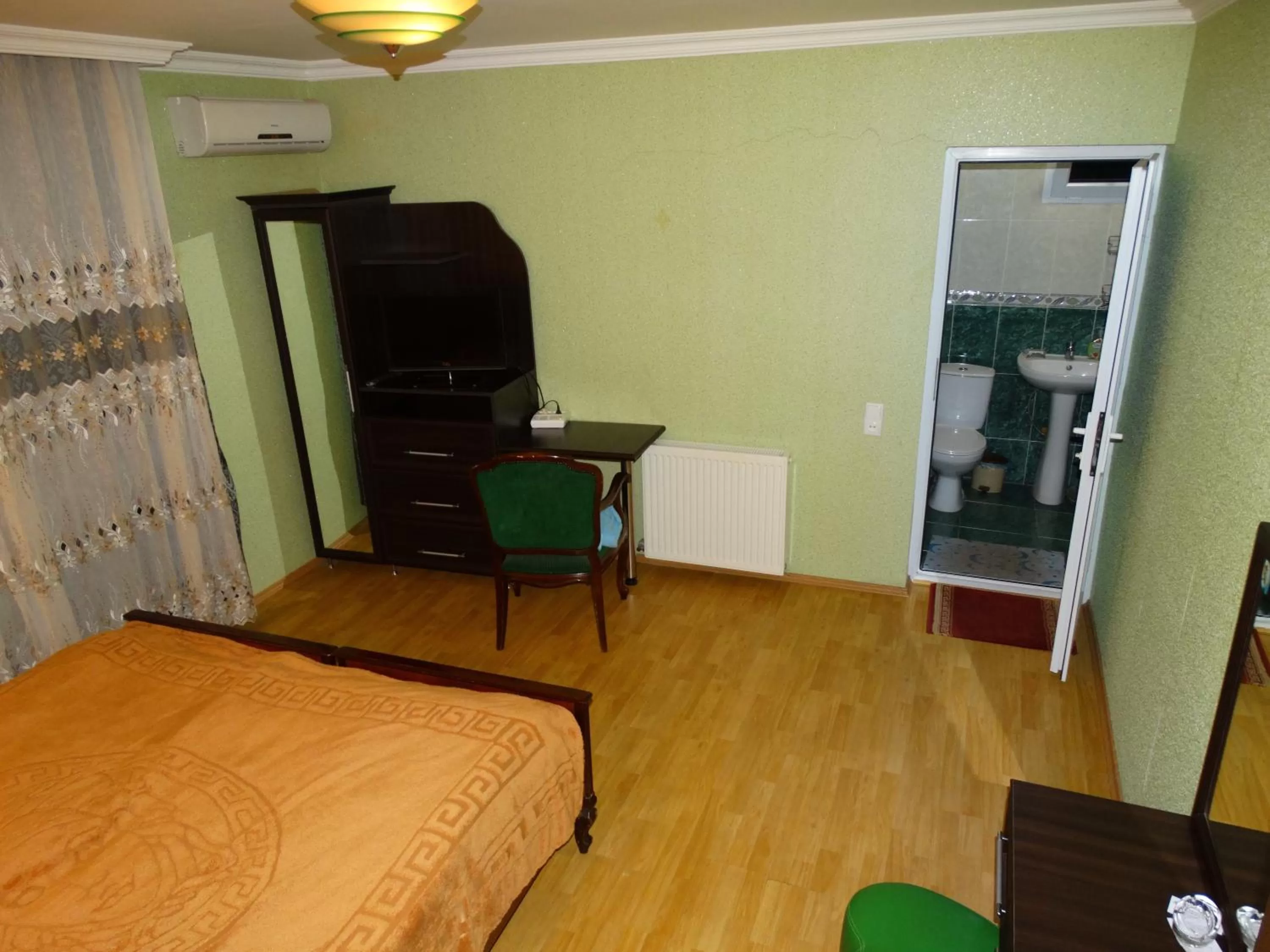 Photo of the whole room, TV/Entertainment Center in Hotel Sano