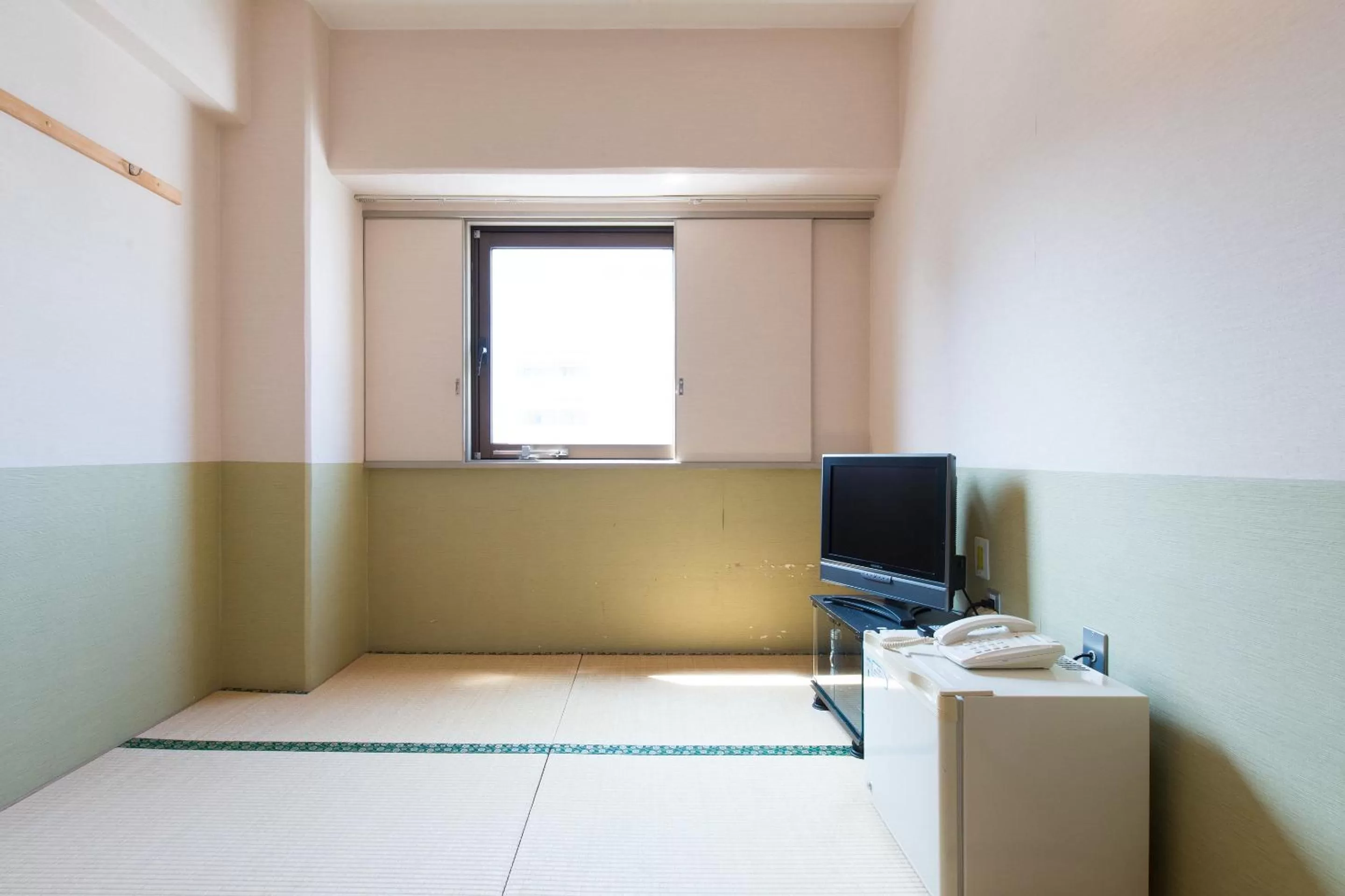 Photo of the whole room, Bed in Tabist Hotel Tetora Kitakyushu
